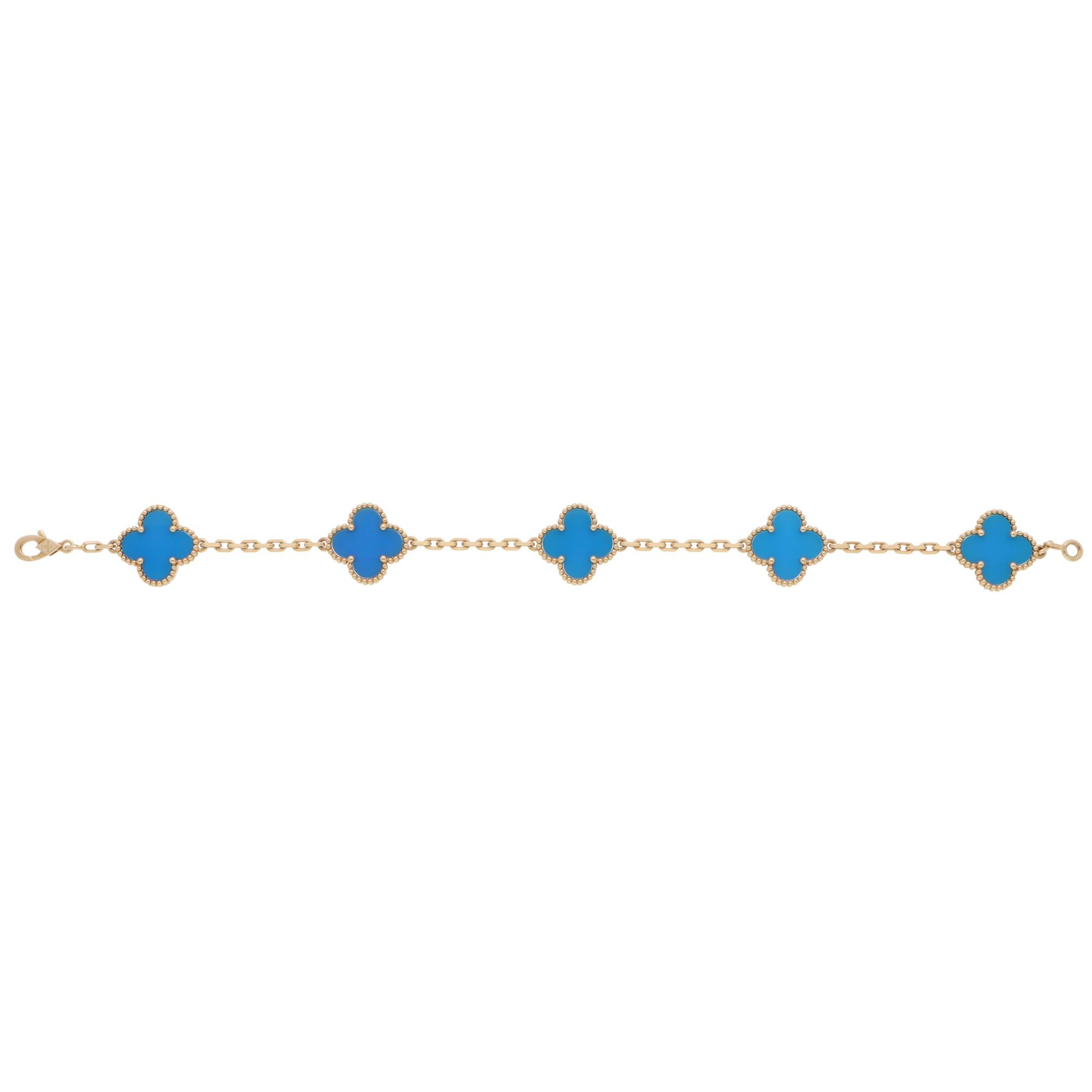 A beautiful vintage Van Cleef & Arpels blue agate Alhambra bracelet set in 18k yellow gold.

The bracelet is set with 5 iconic Alhambra designs in vibrant blue agate. They connect by a yellow-gold trace chain, secured with a lobster claw fastening.