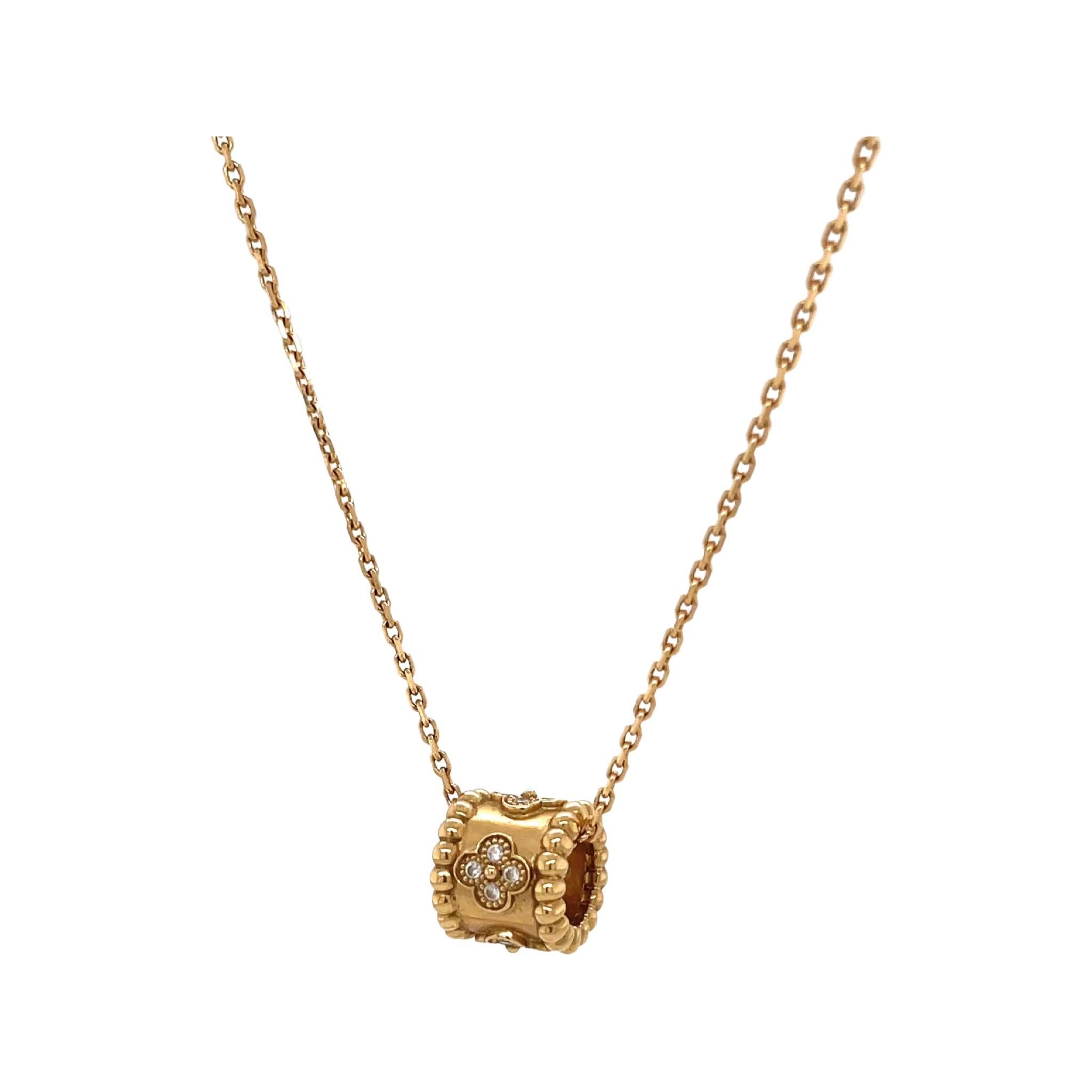 One Vintage Van Cleef & Arpels Diamond 18k Gold Perlée Clovers Pendant Necklace. Featuring 16 round brilliant cut diamonds with a total weight of approximately 0.16 carats, graded D-E color, VVS clarity. Crafted in 18 karat yellow gold, signed VCA,