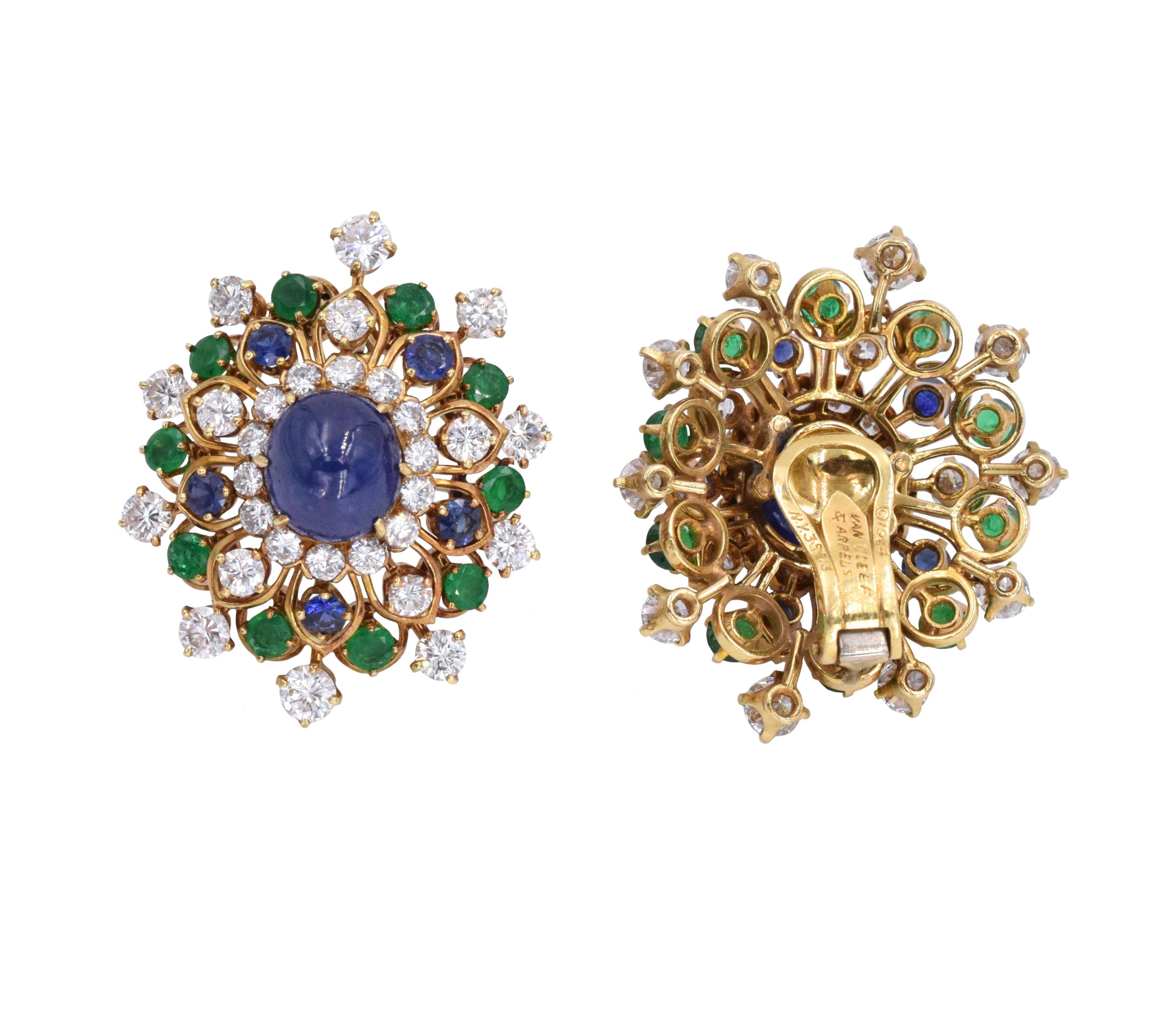 Van Cleef & Arpels Diamond, Gemstone and Gold Earrings. This pair of earrings has 58 round brilliant diamonds with a total carat weight of approximately 7.5ct, 20 round emeralds with a total carat weight of approximately 2ct, 10 round sapphires with