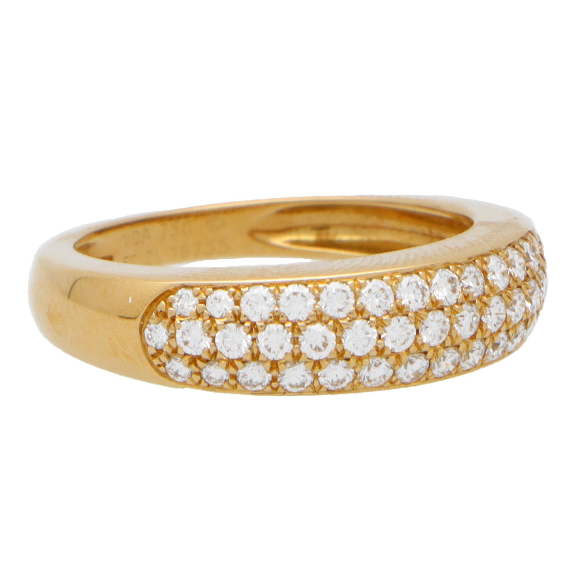 A beautiful vintage Van Cleef & Arpels diamond band ring set in 18k yellow gold. 

The ring is comprised of three rows of round brilliant cut diamonds which are pavé set in a subtle bombé design. The shoulders of the band graduate elegantly round to