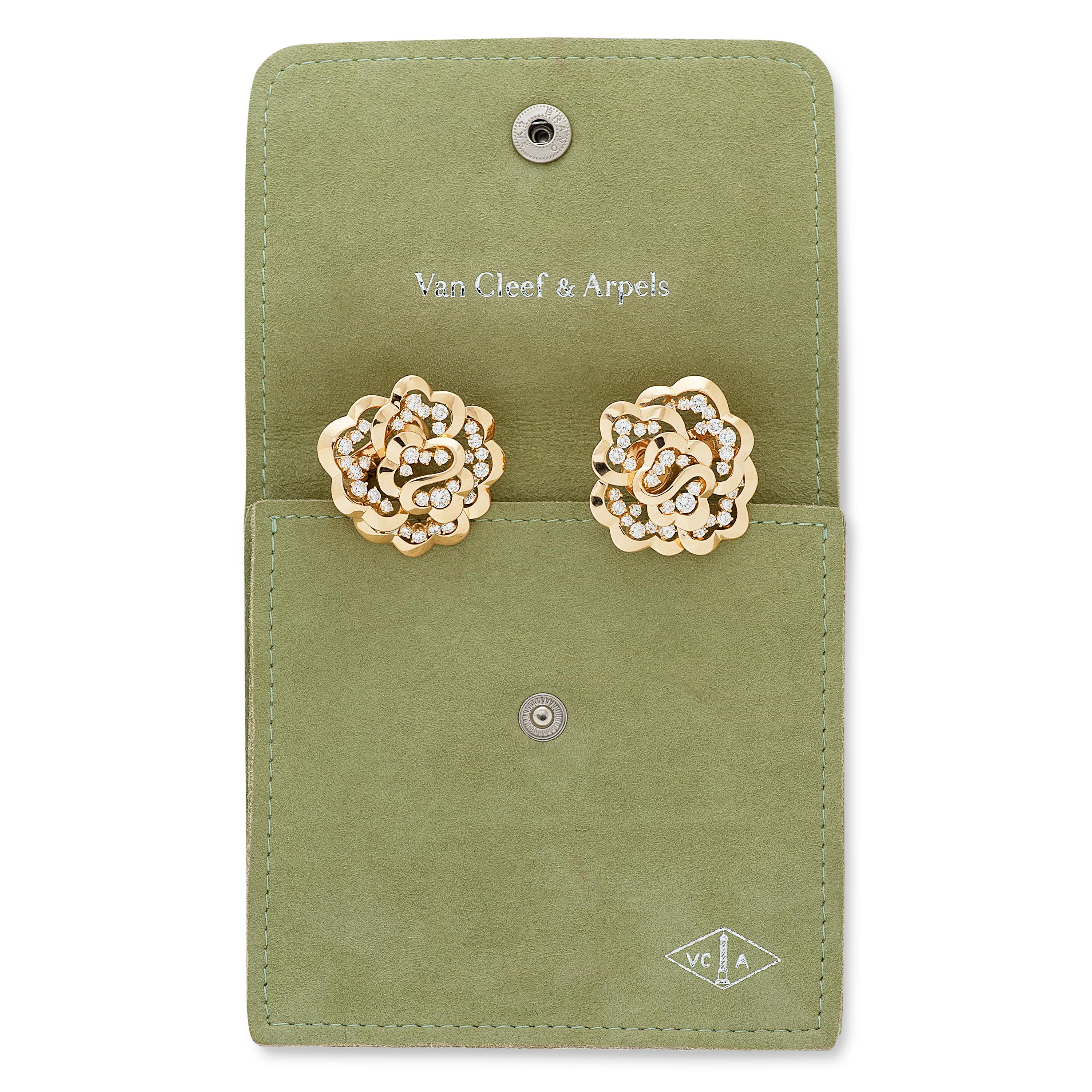 These vintage VCA flower style earrings feature 70 round brilliant cut diamonds totaling approximately 2.80 carats with F+ color and VS clarity set in 18k yellow gold. 

They measure approximately 1.25