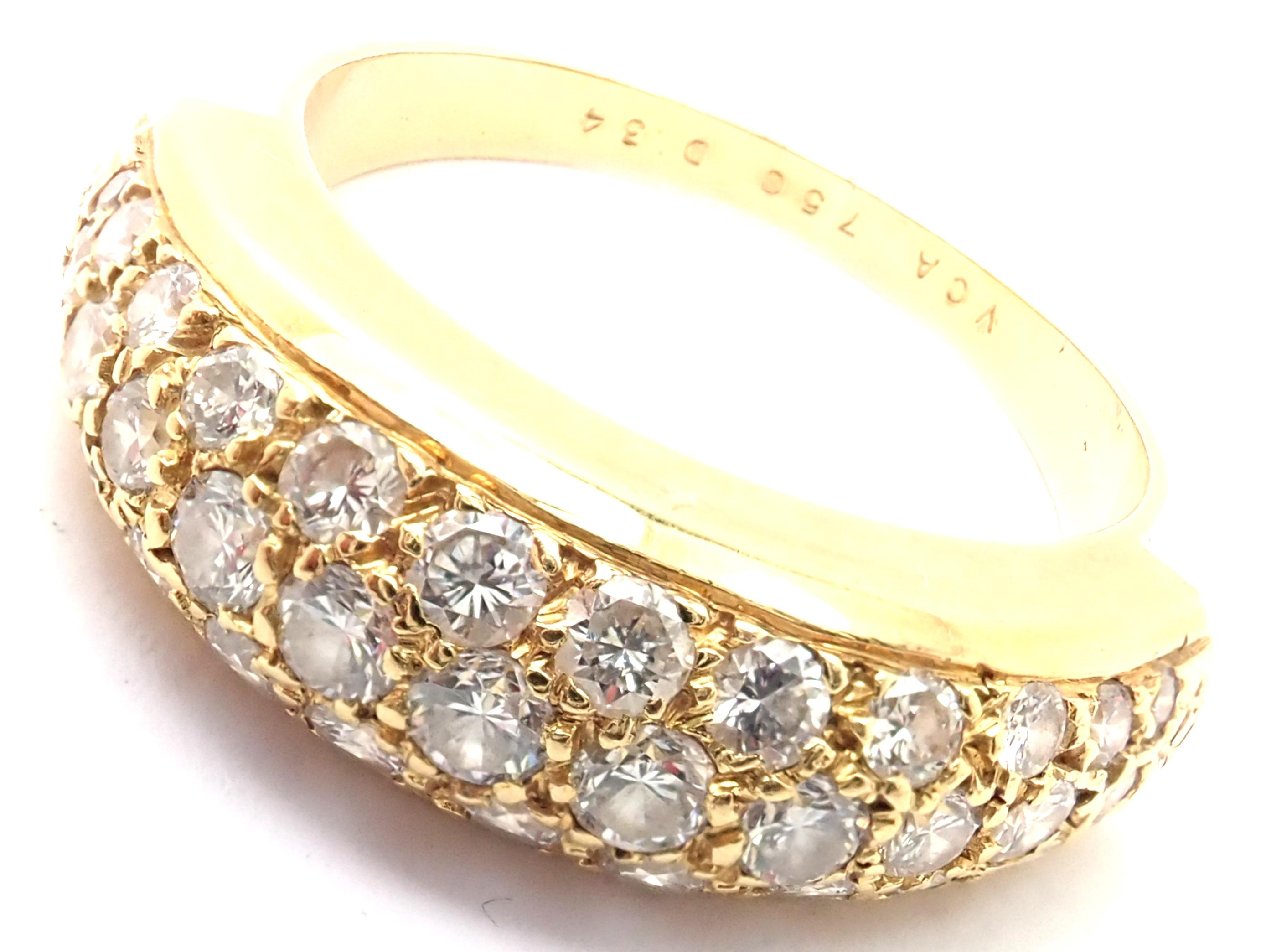 18k Yellow Gold Diamond Band Ring by Van Cleef & Arpels.
With 35 Round Brilliant cut diamonds VS1 clarity, G color total weight approximately 1ct
Details: 
Size: 6 3/4
Width: 7mm
Weight: 5.3 grams
Stamped Hallmarks: VCA 750 D34
*Free Shipping within