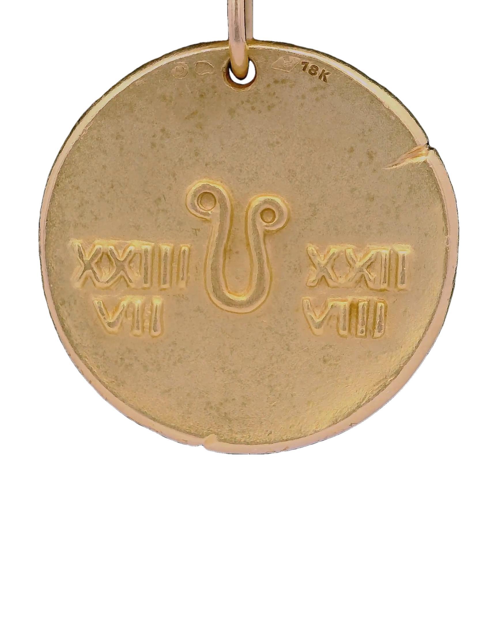 18k yellow gold pendant featuring a detailed lion motif. Designed by George Lenfant & Crafted by Van Cleef & Arpels, France, 1970. Total weight 16.0g. Length 27.6mm. Sizable.