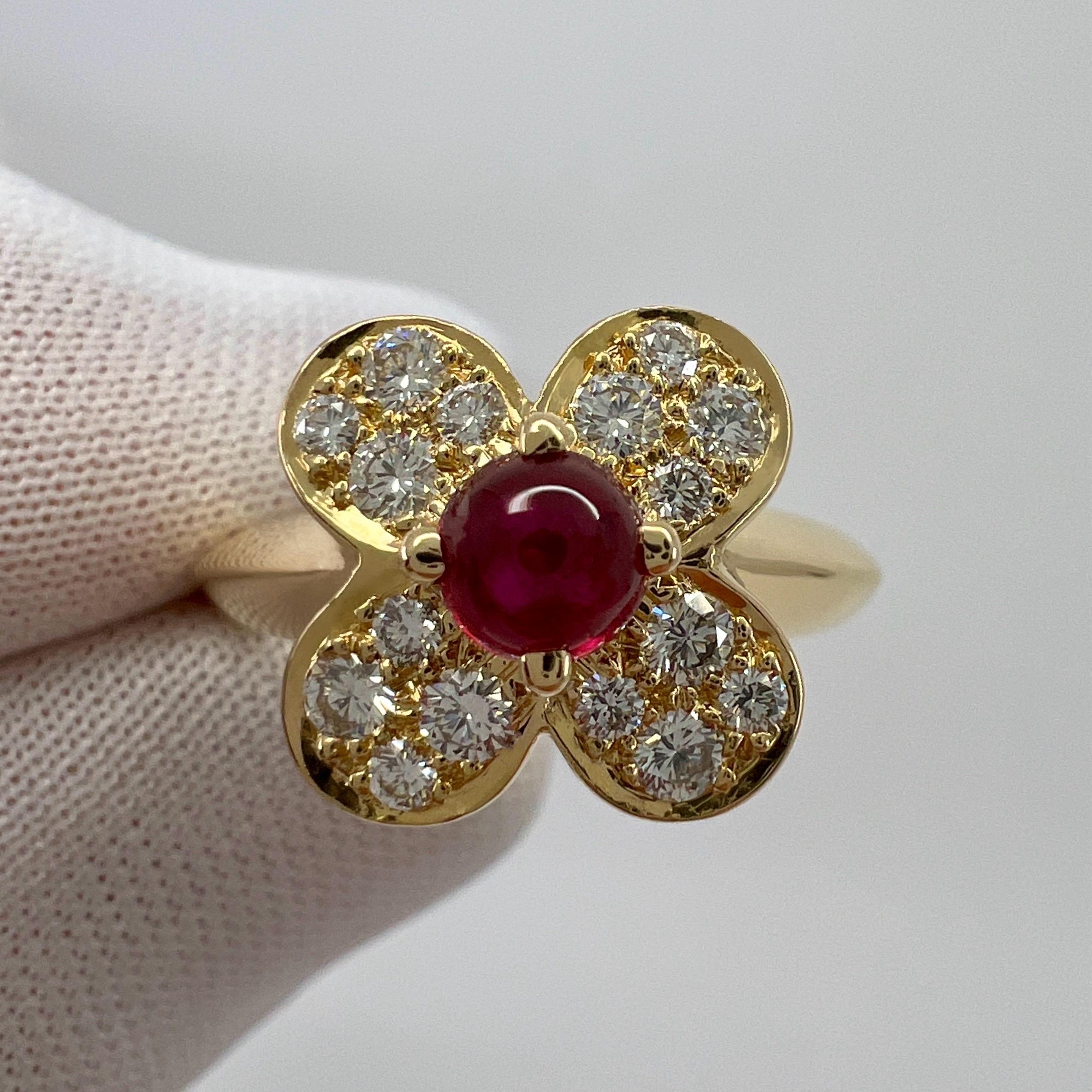 Fine Vintage Van Cleef & Arpels Ruby And Diamond 18k Yellow Gold Trefle Flower Ring.

A stunning vintage ring with a unique floral design typical of Van Cleef & Arpels, set with a beautiful natural round cabochon ruby and diamonds in a classic