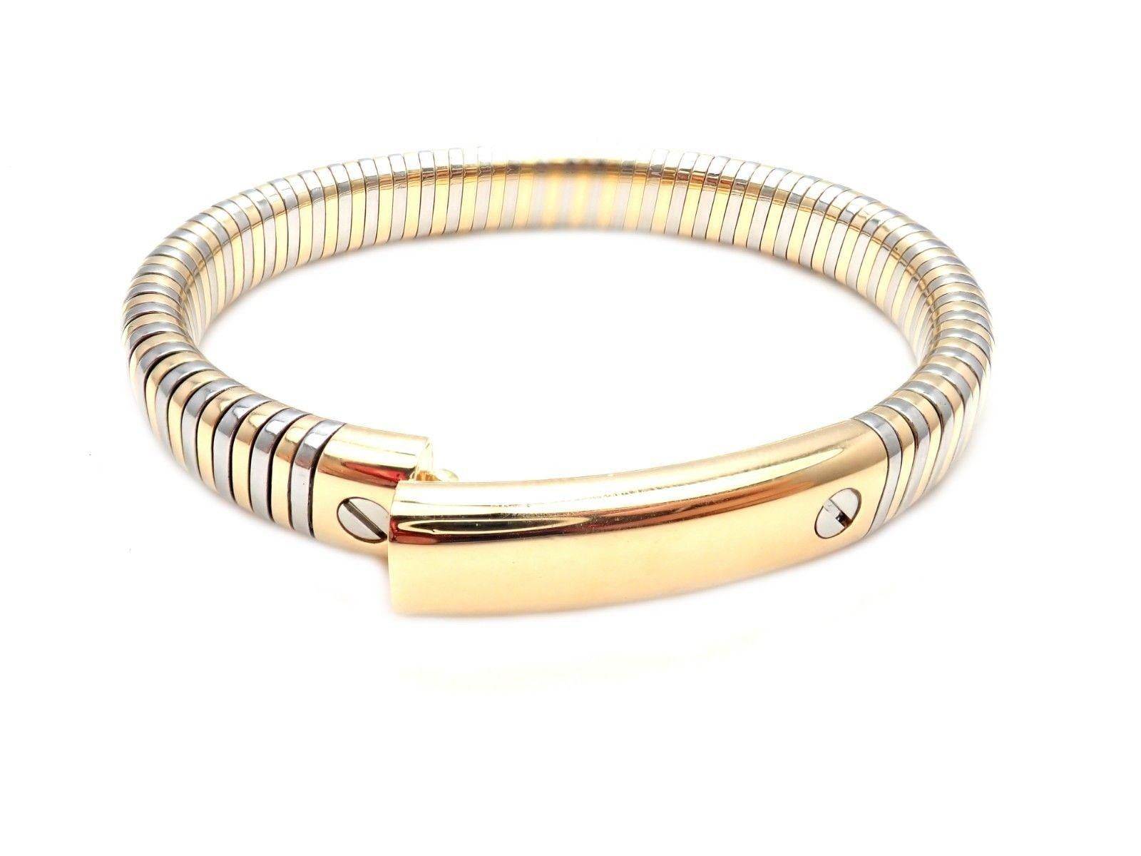 18k Yellow Gold And Stainless Steel Bangle Bracelet by Van Cleef & Arpels. 
Details:
Length: 7.5