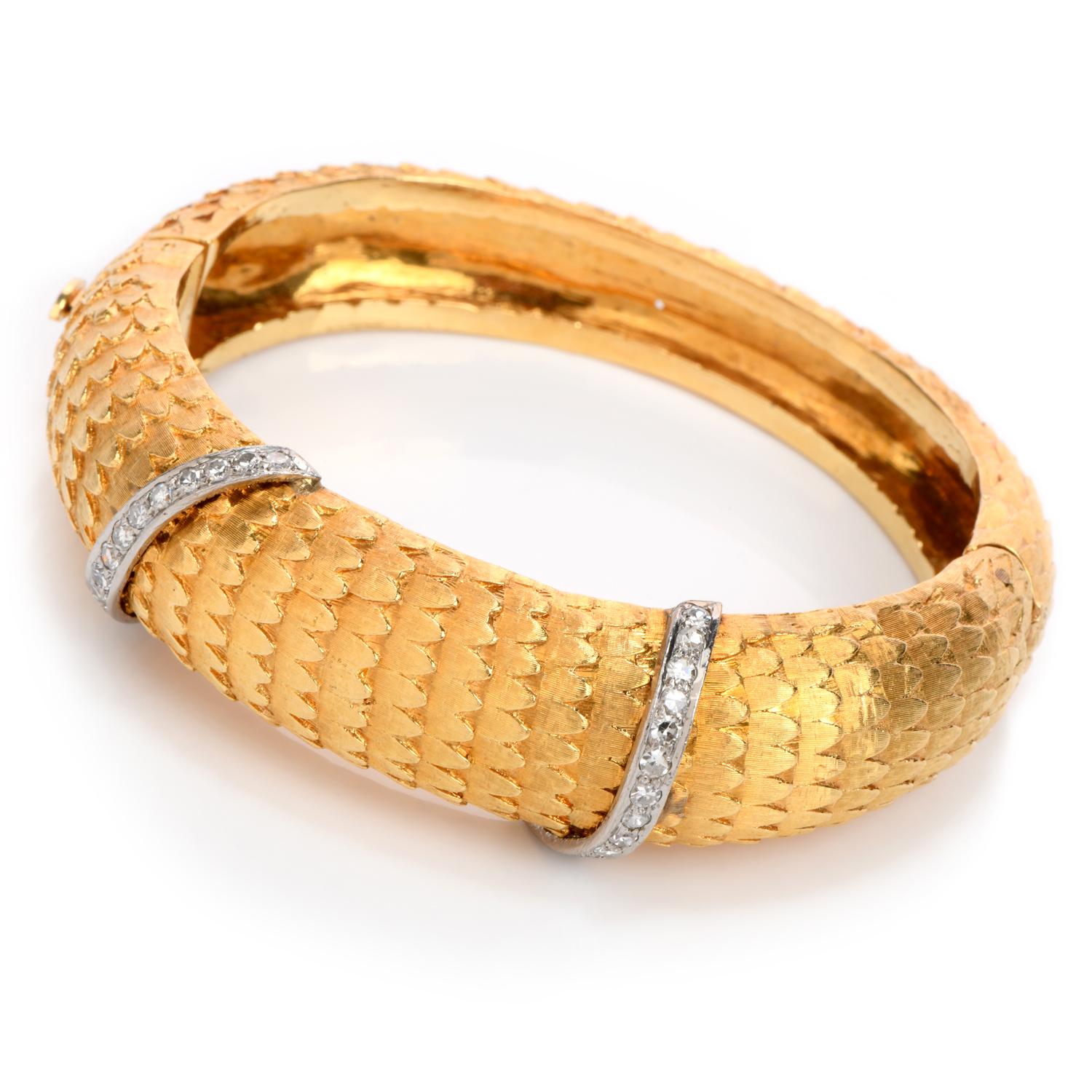 Acquire a piece of art with this mystical Vintage Van Gogh Diamond 18K Gold Feather Motif Bangle Bracelet!  

This enchanting bracelet is crafted in 18 karat yellow and white gold.  There are two ribbons of white gold with approximately 28