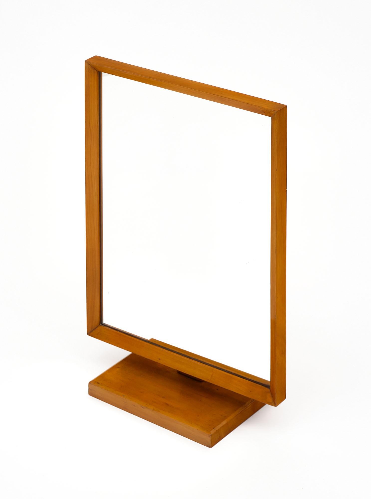 Mirror for a vanity made of solid maple. This piece is can be oriented as needed. It is from France.