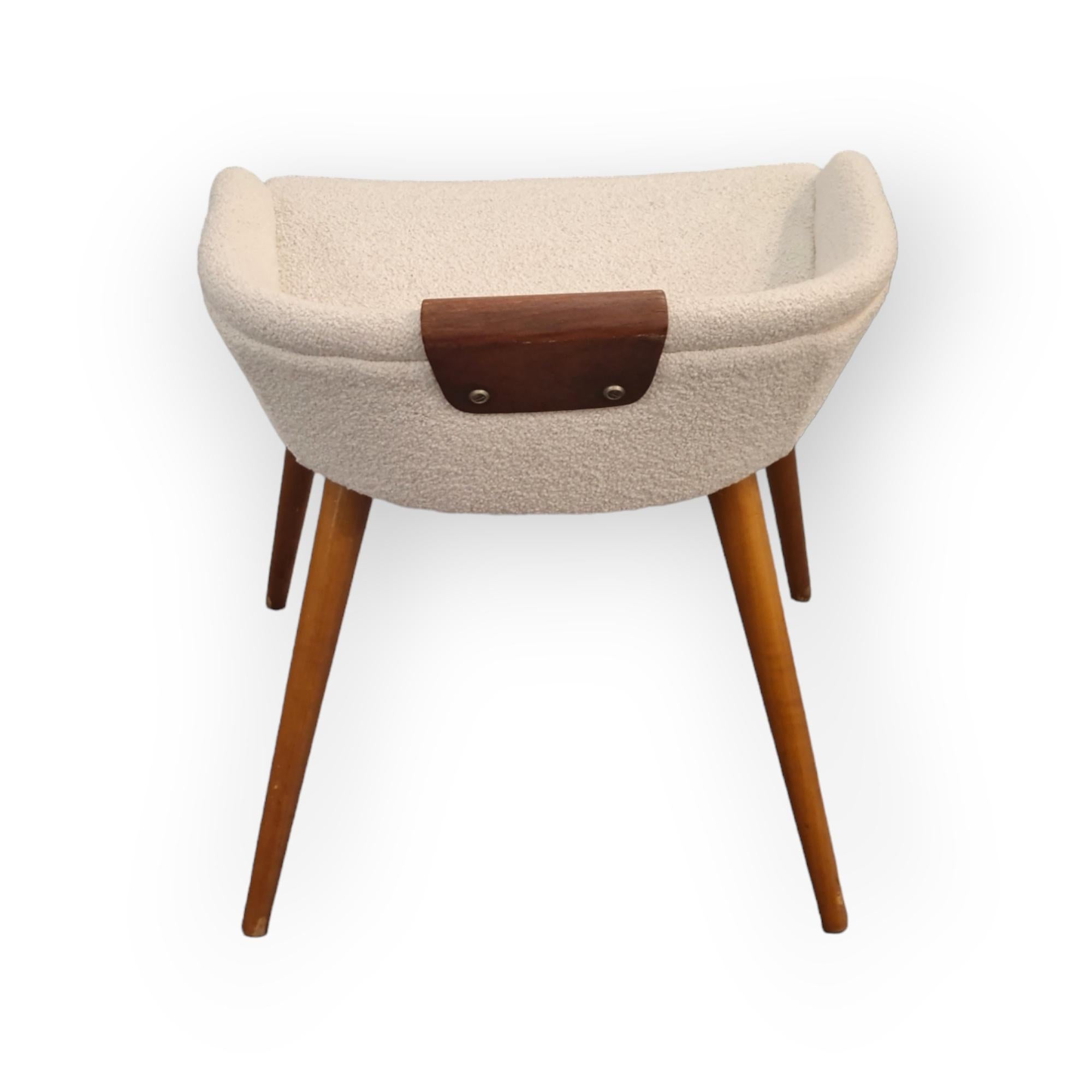 A beautiful vintage vanity stool designed by Finnish designer Kurt Hvitsjö and made by Lahden Puukalusto Oy which later became known as Isku, one of the main competitors of Asko and situated also in Lahti city. 
The chair is part of a vanity set,
