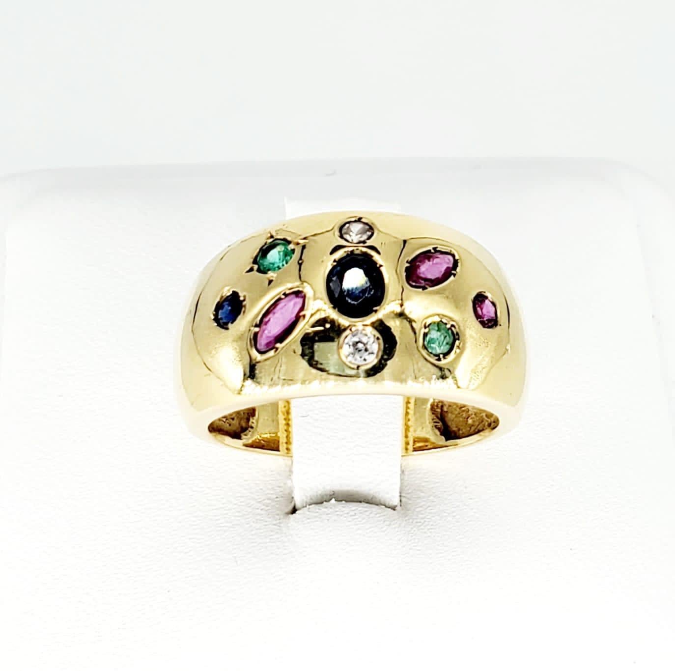 Vintage Various Shapes Ruby, Sapphire, Emerald & Diamond 18k Gold Dome Ring. The total approx carat is 1 carat. The ring is made of 18k solid yellow gold and weights 4.5 grams. The ring is a size 7
