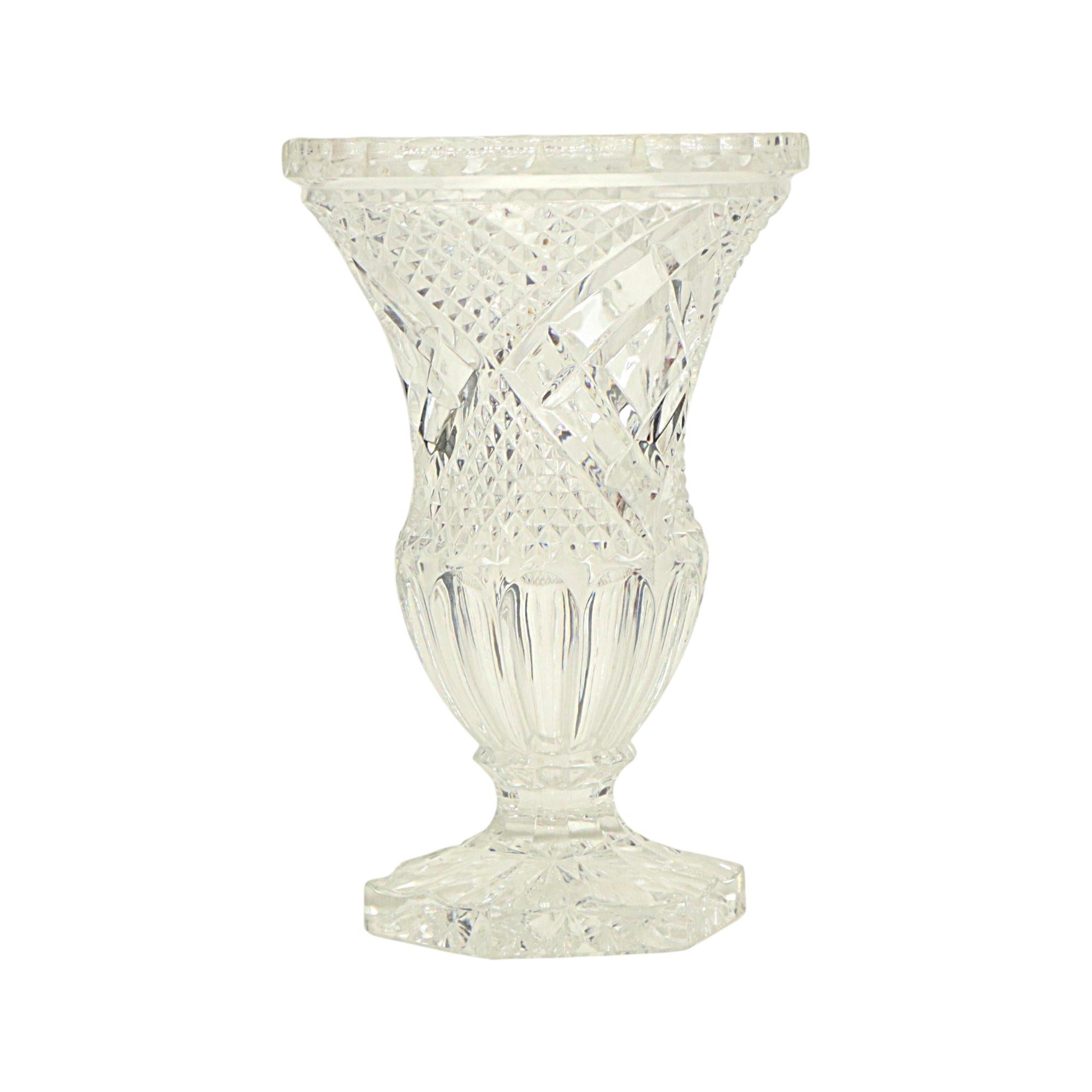 Vintage transparent vase made of Bohemian lead crystal, the vase has beautiful diamond patterns and is made in the shape of a Medici urn, Eastern European, circa mid 20th century.

Beautiful vase with very fine details, quality object that is in