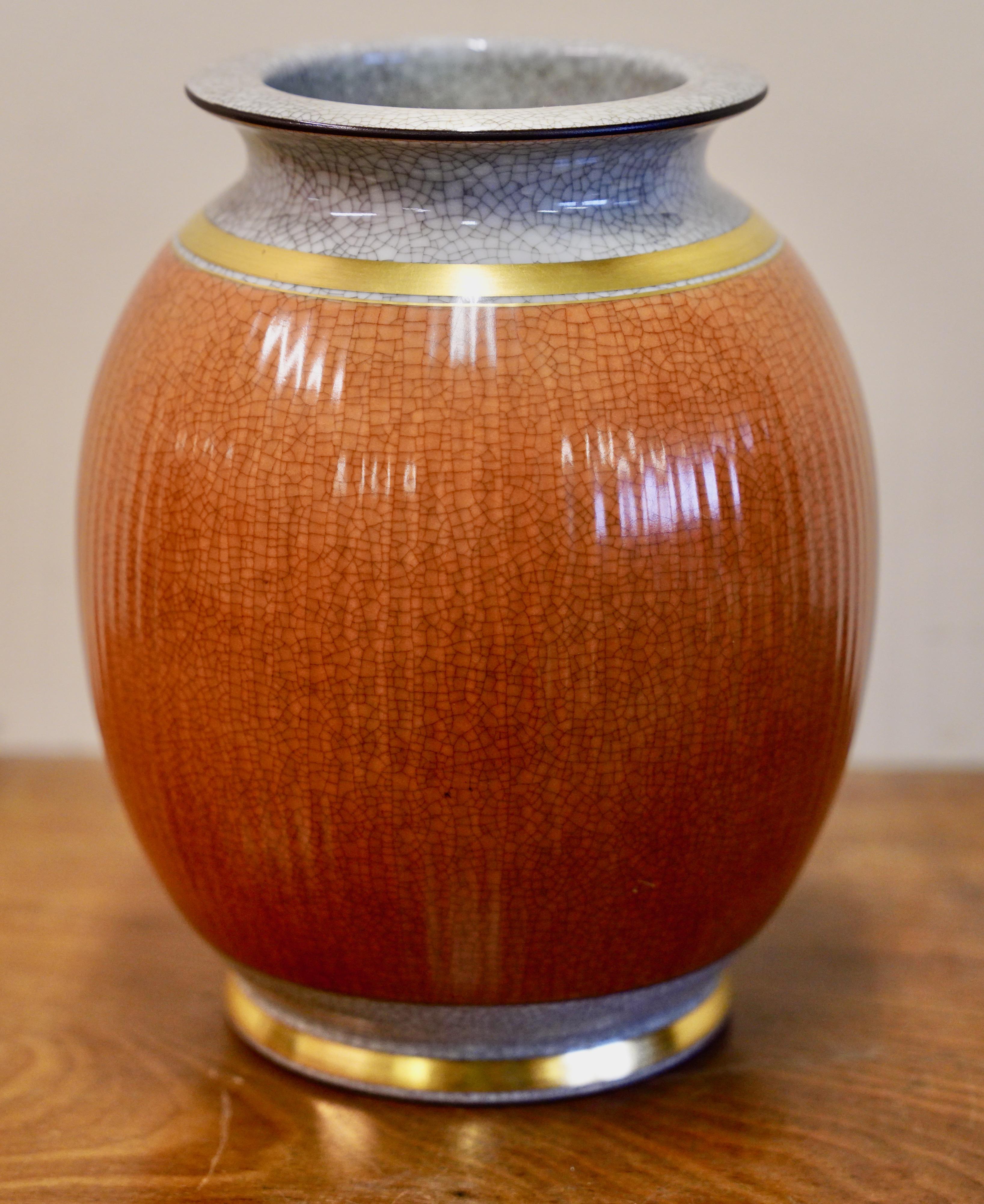 Vintage vase from Royal Copenhagen, porcelain with crackle glaze, Scandinavian art

This beautiful vase from Royal Copenhagen is an exquisite example of the high quality and fine craftsmanship for which the manufacturer is known. The vase impresses