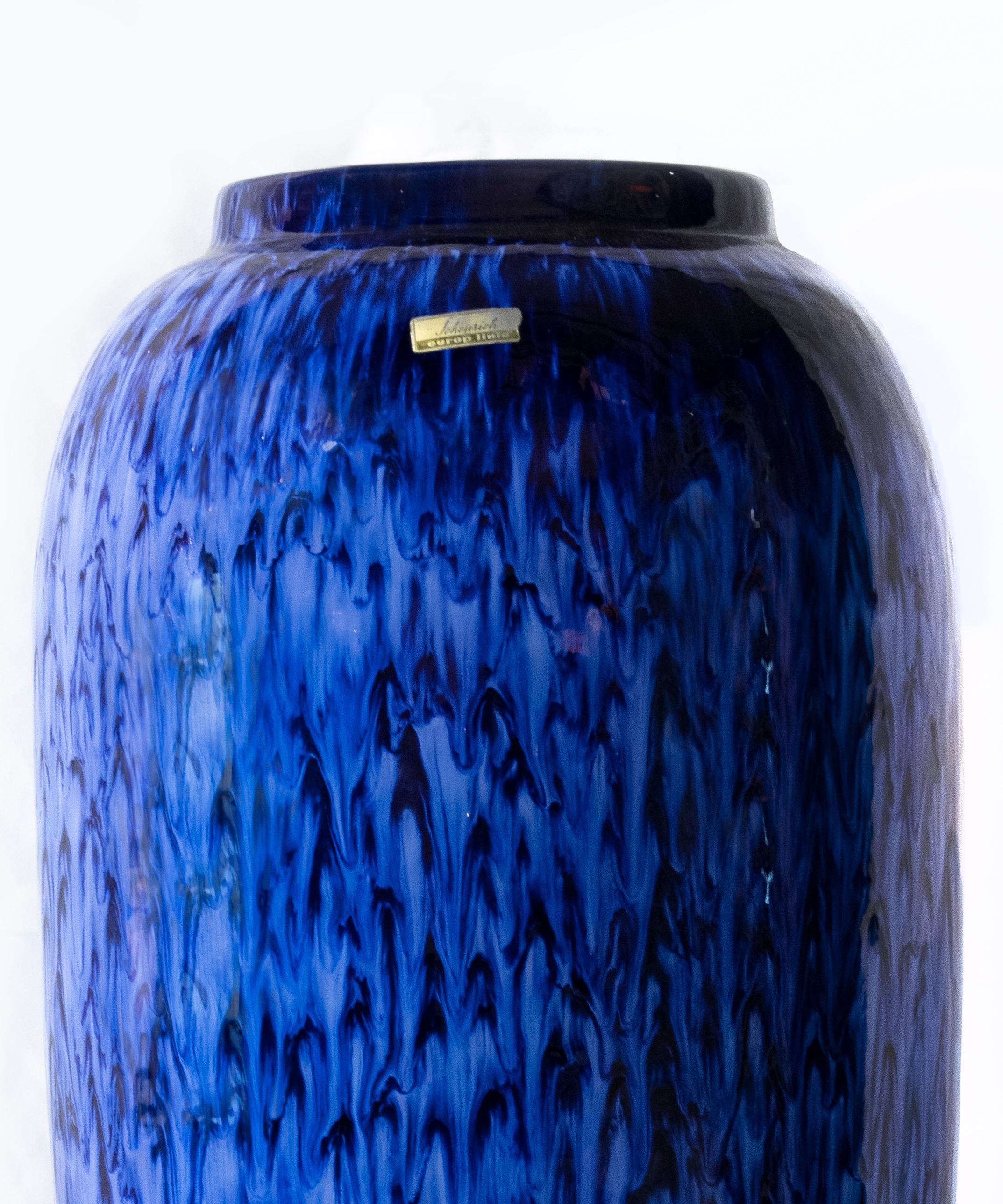 Scheurich vase is a wonderful blue colored vase realized by Scheurich.

Very good conditions.

Ceramic vase with label on side.

this is the perfect decorative object perfect for your house!

The Scheurich pot collection is the world's best