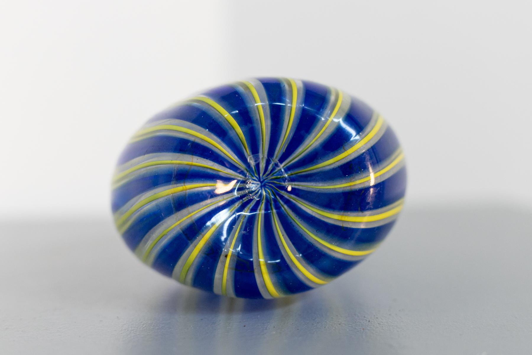 Beautiful vase made of Murano glass attributed to the great Venini of the '50s. 
The colours are bright and contrasting, the processing of the yellow and blue coloured glass creates a spiral under the base and gives an enveloping effect. It is