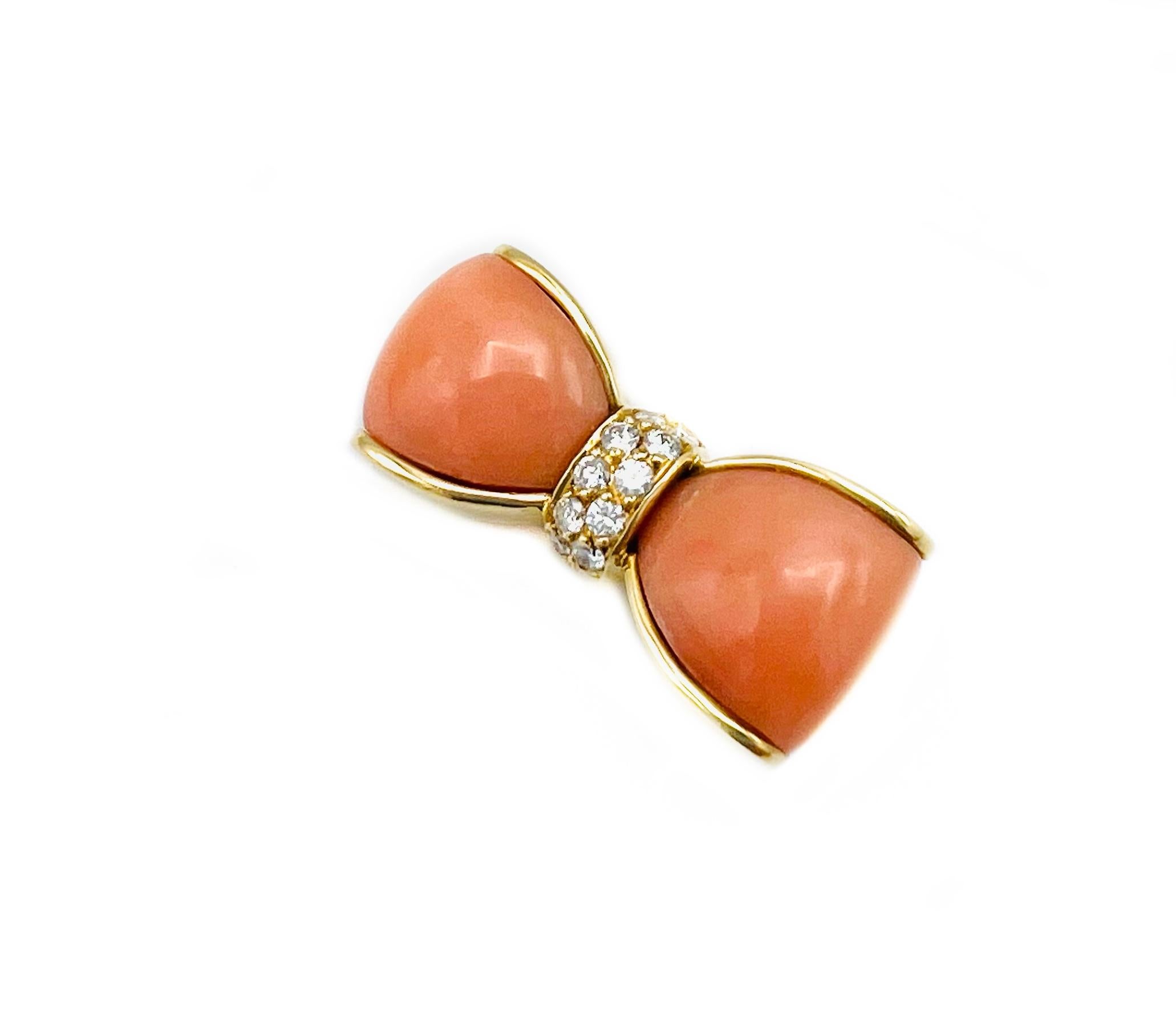 Product details:

The brooch is made out of Mediterranean coral and 0.19 carats of round brilliant cut diamond, set in 18K yellow gold. Made in France.

Hallmarks: eagle head, VCA, 18K, serial number B1327K19, 0.19
Measurement: 1” x 0.25” x