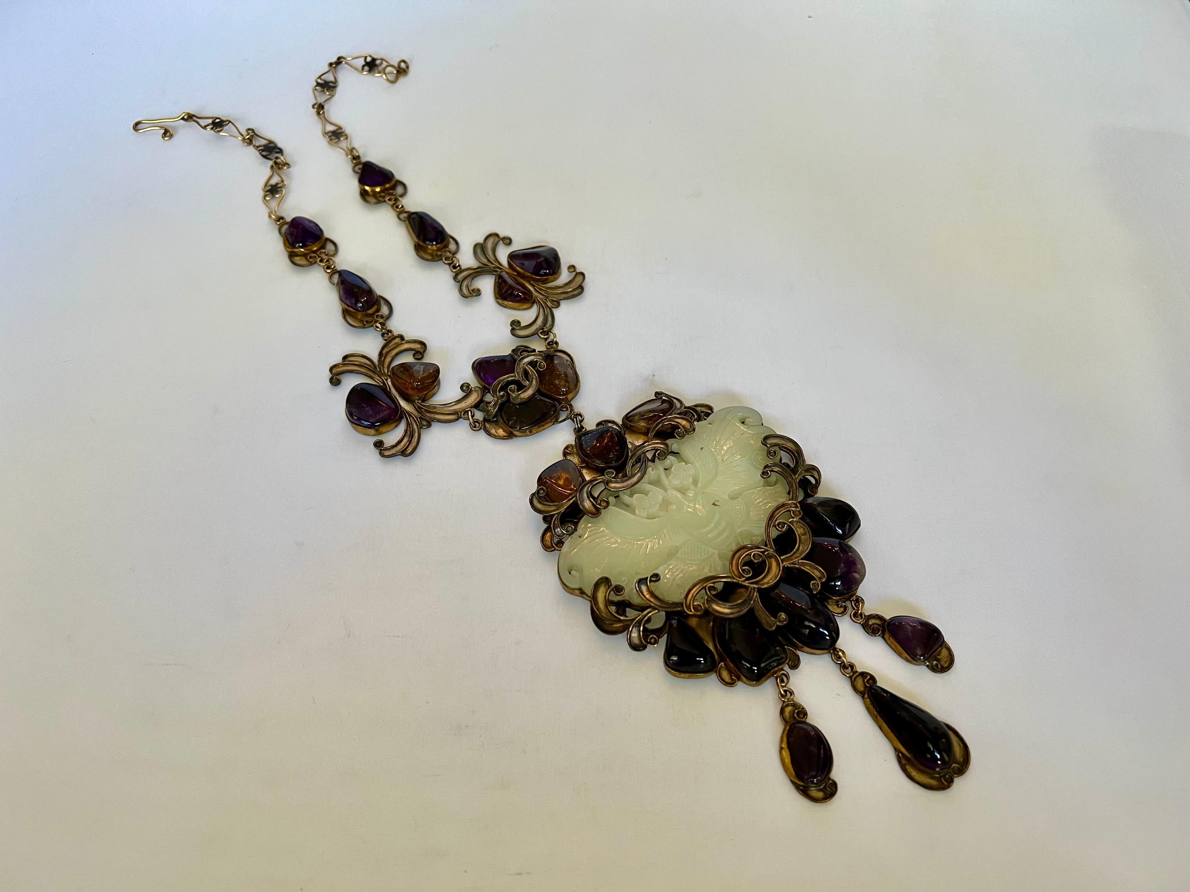 Very rare vintage large silver pendant necklace by Vega Maddux in an Art Noveau  style- the necklace is comprised out of silver and features a large carved nephrite butterfly which is surrounded by large amethyst cabochons. Highly collectible.