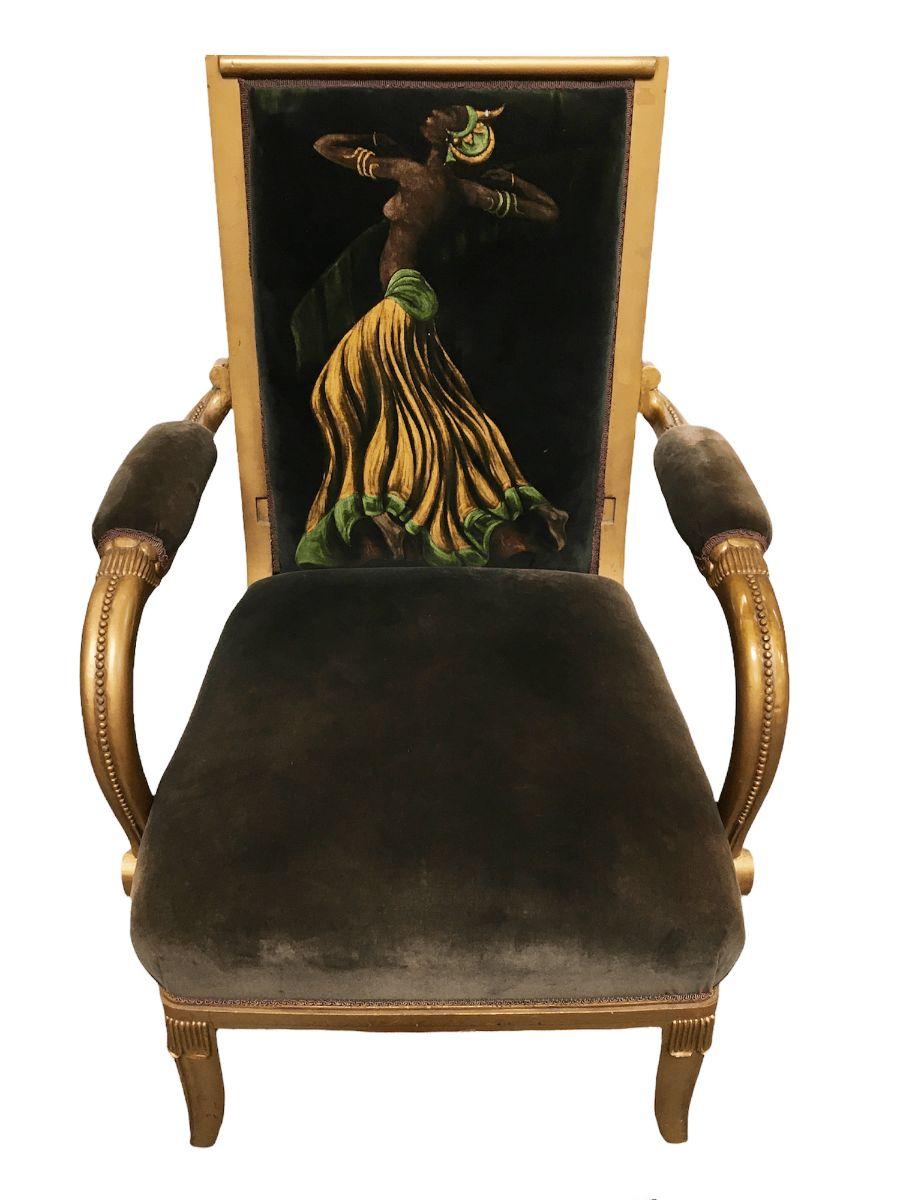 Vintage velvet upholstered gorgeous armchair with a painted dancer on the back.$2,600
 
This gorgeous armchair features a painted dancer on its back. Ornate carved details all around. A solid piece of furniture.
It measures 30.5