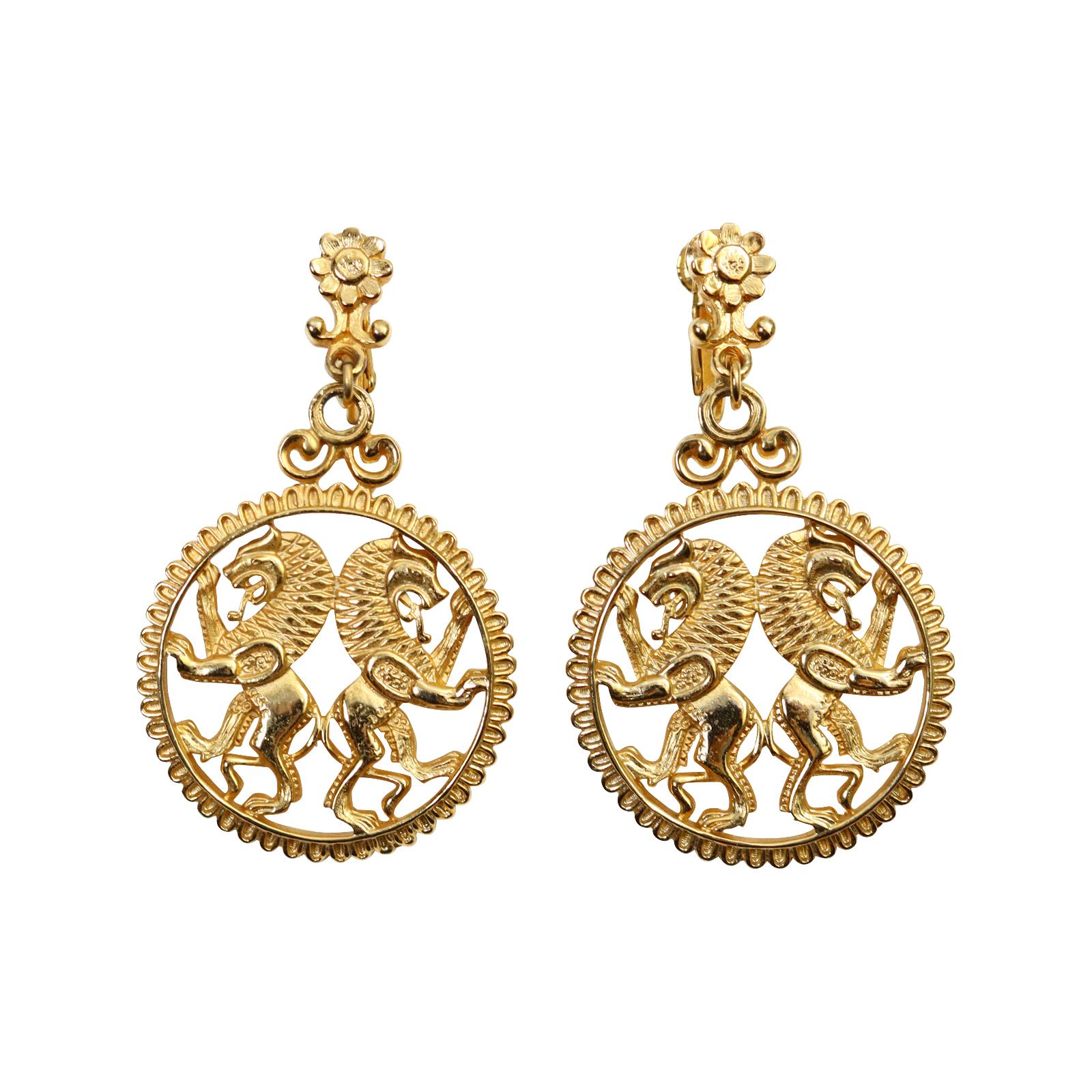 Vintage Vendome Gold Tone Dangling Double Lion Earrings Circa 1970s.  These have the most divine look on. Clip on. These double lions are so regal looking and make such a statement.  From the top of the earring which has a detail flower to the