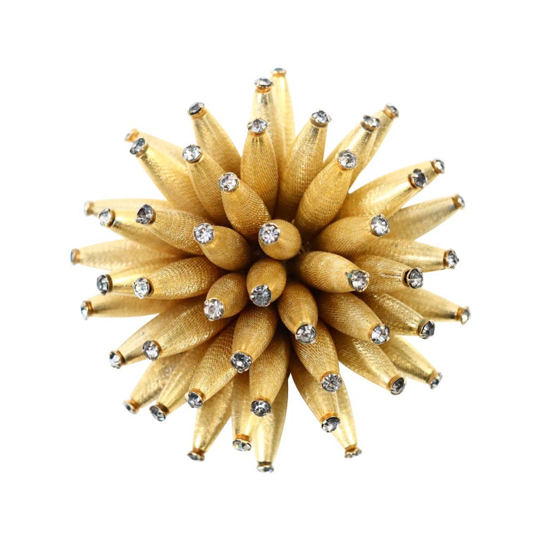 Vintage Vendome Spiky Gold Tone With Diamante Brooch Circa 1970s. Great as a brooch but also on a black cord.  I will be hapy to give you one so just ask me.