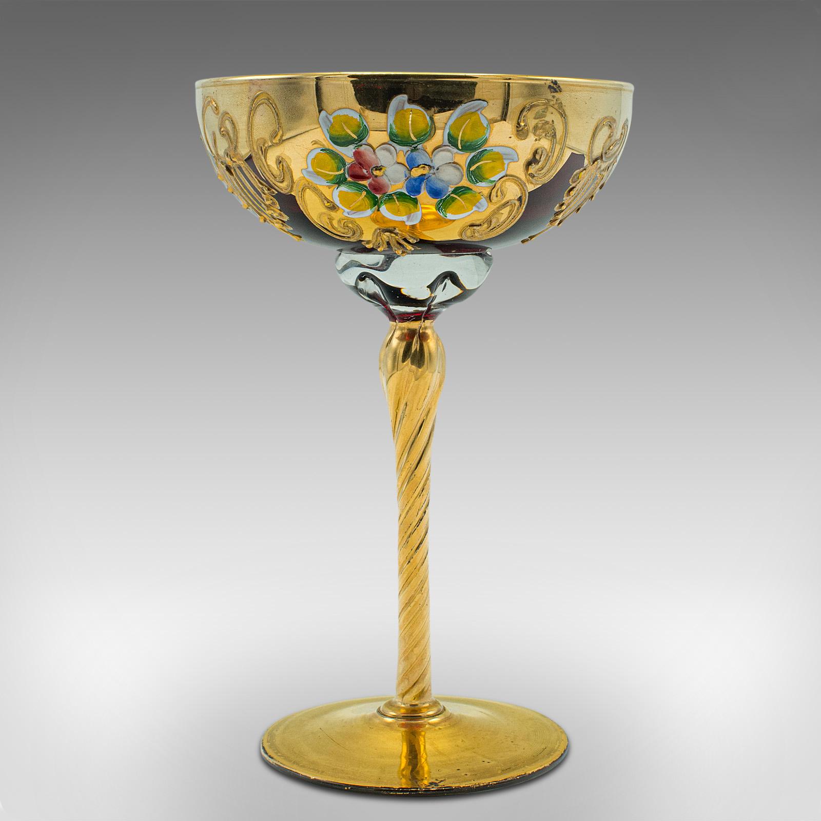 This is a vintage Venetian libation cup. An Italian, art glass and gilt finished decorative wine flute, dating to the late 20th century, circa 1970.

Raise a glass with this striking libation cup
Displays a desirable aged patina and in good