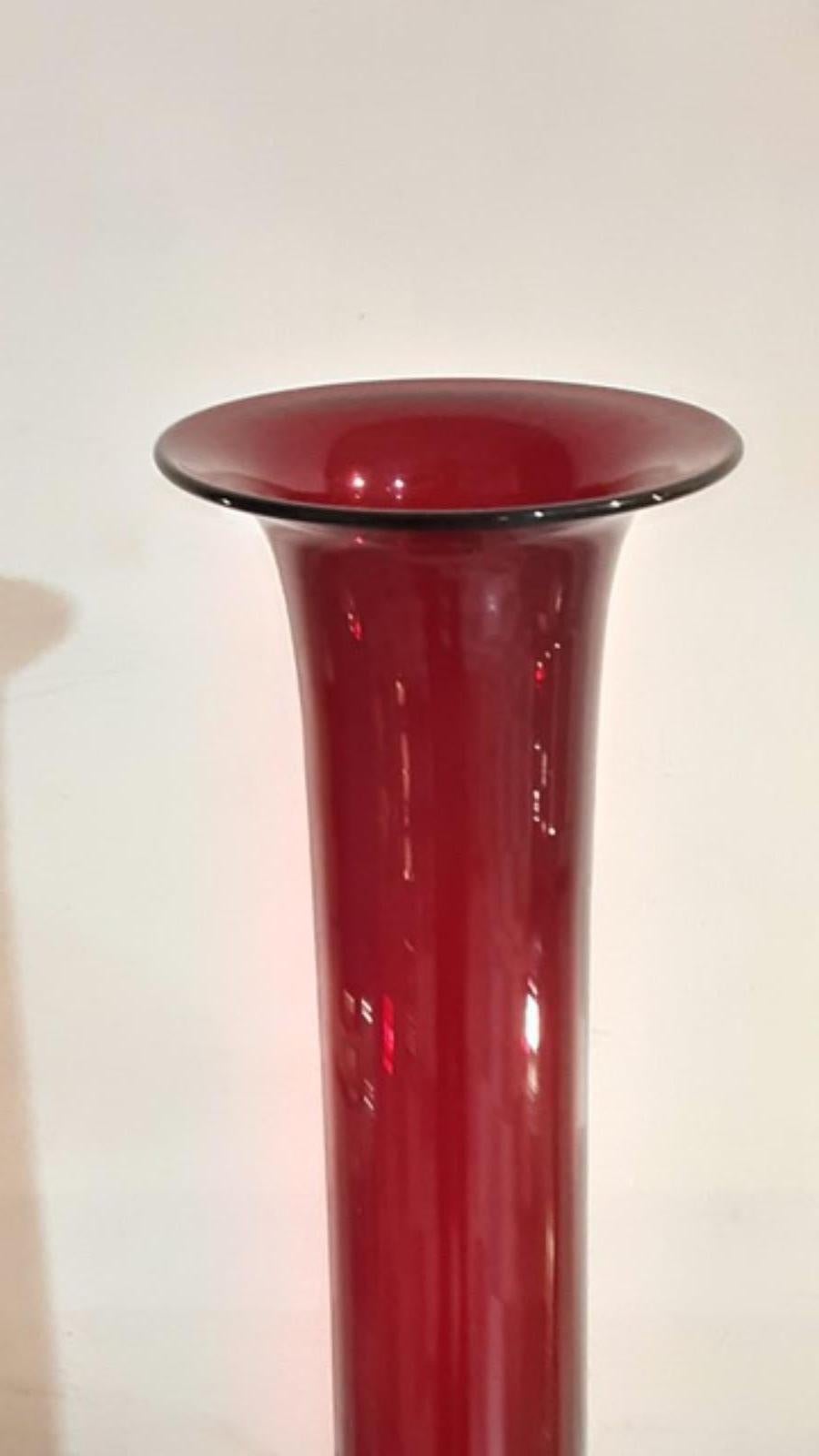Red Venini vase is an original decorative vase was realized by Venini in the 1970s

Elegant red Murano glass vase. Marked under the base.

In excellent conditions.

Produced by Venini

Paolo Venini (1895 – 1959) emerged as one of the leading