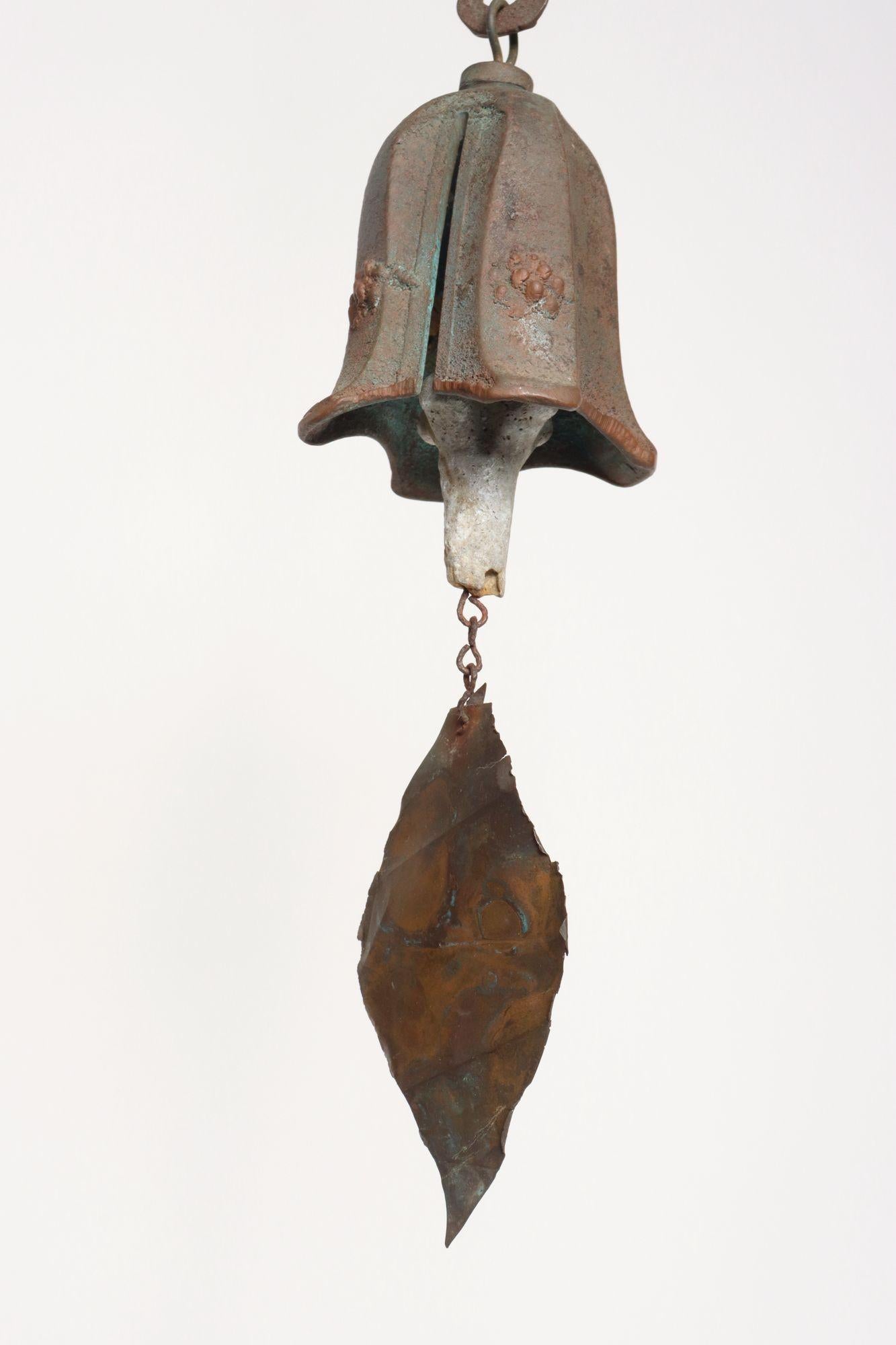 Cast bronze wind bell/chime made by former Cosanti Soleri Foundry metalsmith and designer, Joe Ursutz, Sr. (ca. 1960s, USA).
Ursutz, who was invaluable to Paolo Soleri during his career at Cosanti, inspired multiple wind bells. He later went on to
