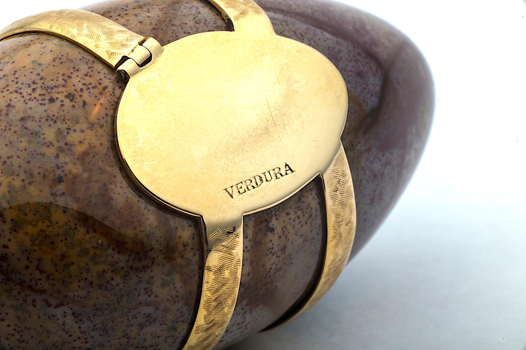 The Ancients said that the egg symbolizes the beginning of  creation along with good luck, wealth, and great health, and by owning this vintage Verdura agate egg you are sure to acquire it all.  Wrapped in an 18 karat yellow gold bowed ribbon, with