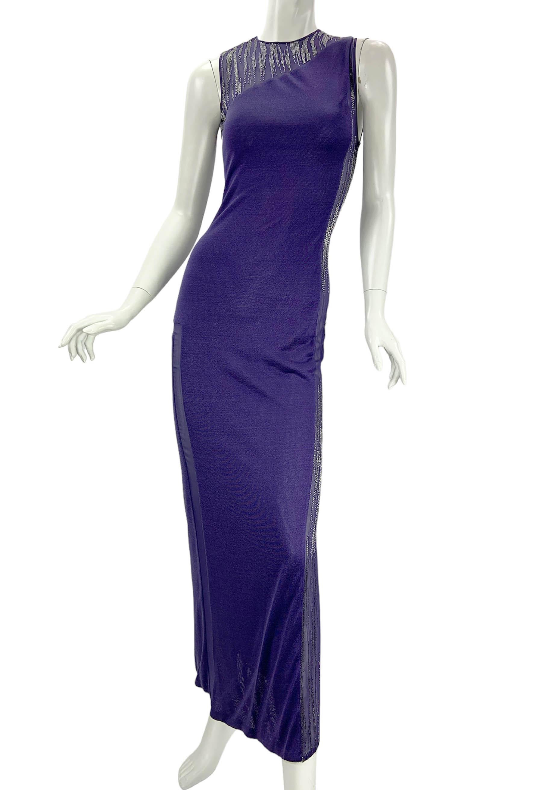 Vintage Versace Atelier Sheer Panels Embellished Dress
No size as it is a haute couture piece. Approx. S/XS.
Purple jersey, sexy sheer silk chiffon light purple panels with silver tone tube beads, lined in same jersey fabric, side zip closure,