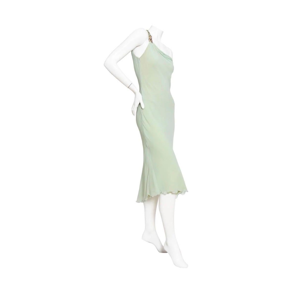 One Shoulder Crystal and Silk Green Dress by Versace Atelier
Circa late 1980s
Two-tone; top layer is mint green and bottom is pale chartreuse
Multicolored crystal embellished strap
Bias silhouette
Ruffled hem
Side zipper closure
Semi-sheer
Nude