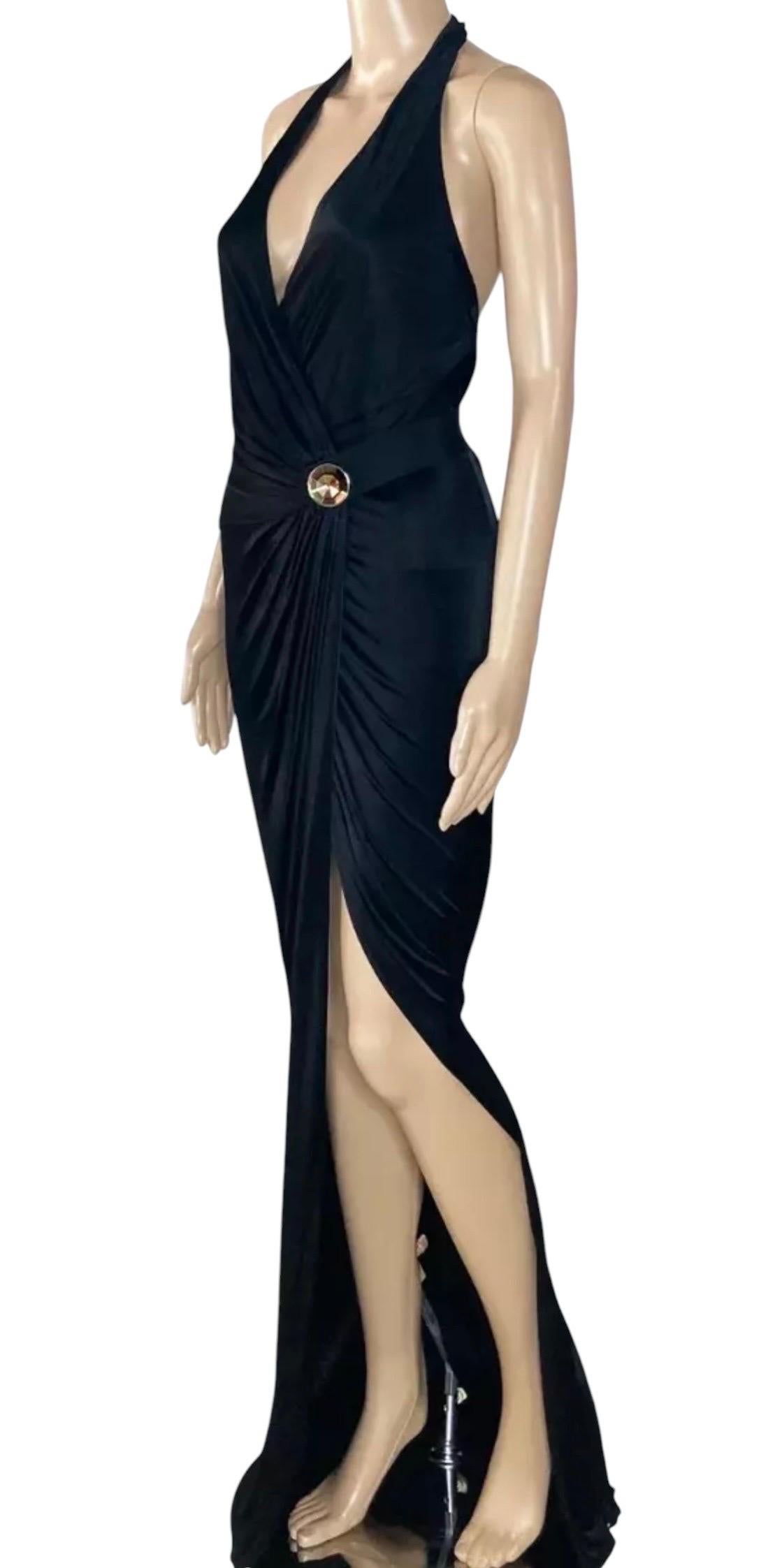 VERSACE 
Black Viscose Long Dress
Deep V-neck
Open back
Wrap style
Crystal button
Content: 100% viscose
Lining: 100% viscose
IT  Size 42 - US 6
Armpit to armpit: up to 20