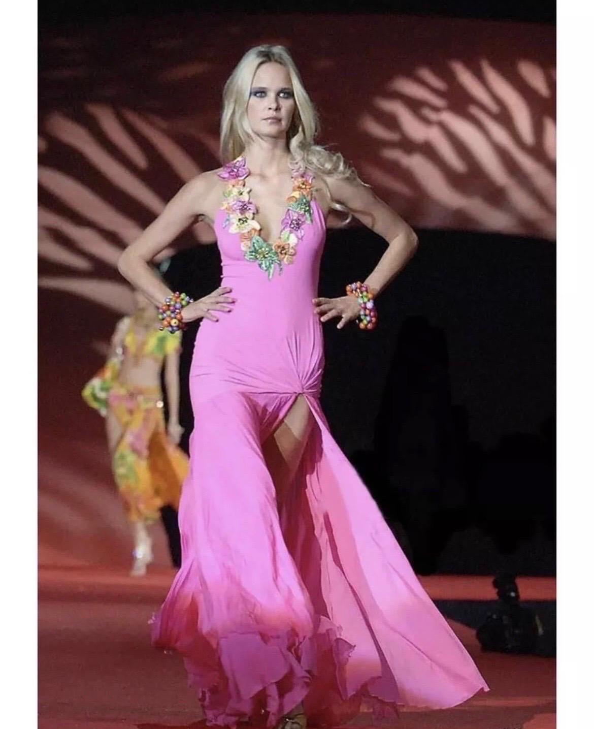 Vintage Mid 2000-s VERSACE
Hot Pink Gown with Embroidery and Crystals.
Versace is known for its floor-skimming gowns.
Content: 98% silk, 1% elastane, 1% polyamide. 
IT Size 40 - US 4 
armpit to armpit 18