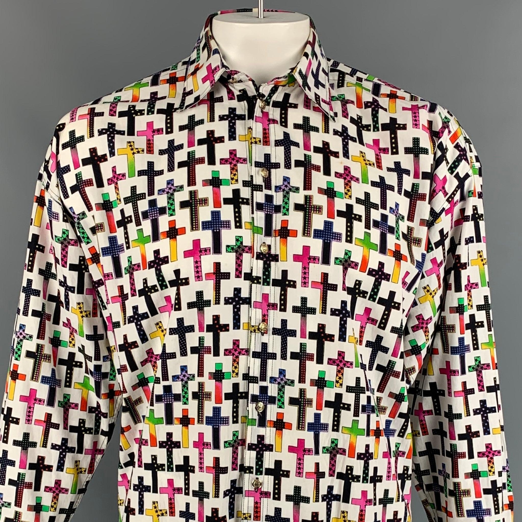 Vintage VERSACE JEANS COUTURE long sleeve shirt comes in a multi-color cross print cotton featuring a loose fit, medusa head buttons, pointed collar, and a buttoned closure. Made in Italy.
Very Good
Pre-Owned Condition. 

Marked:   M 

Measurements:
