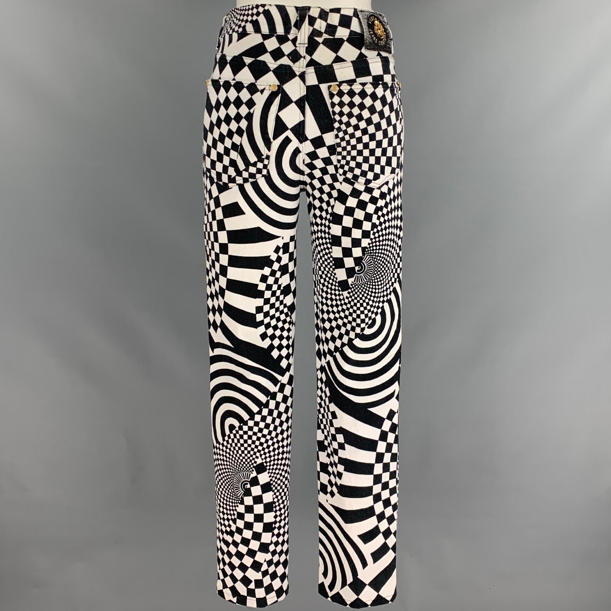 Vintage VERSACE JEANS COUTURE jeans comes in a black & white geometric cotton featuring a skinny fit, gold tone hardware, and a zip fly closure. Made in Italy.

Very Good Pre-Owned Condition.
Marked: 36/50

Measurements:

Waist: 30 in.
Rise: 11
