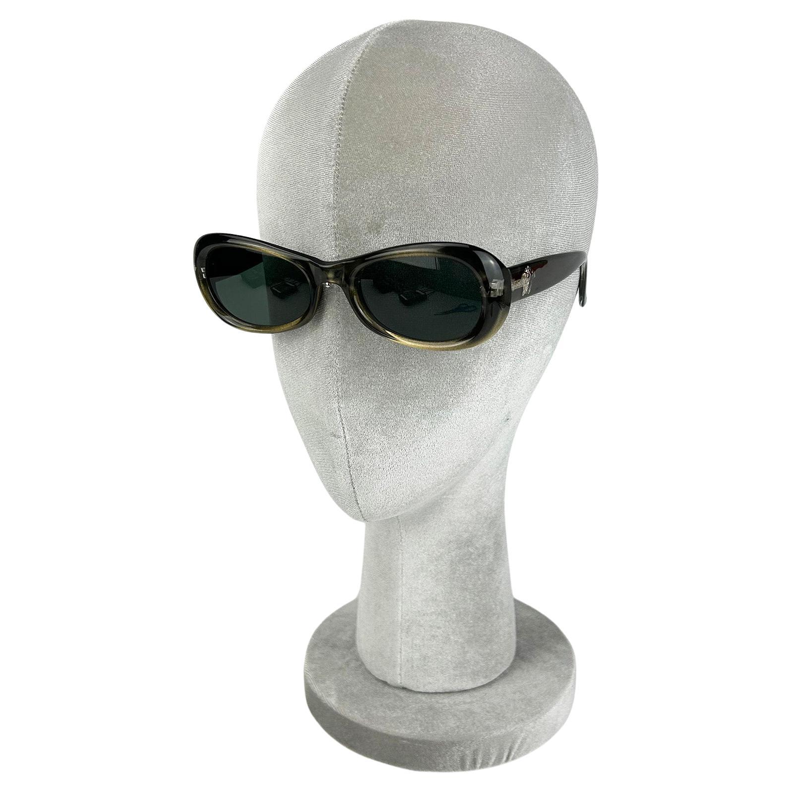 Occhiali da sole vintage Versace Greene & Greene con montatura ovale, anni '90 circa
