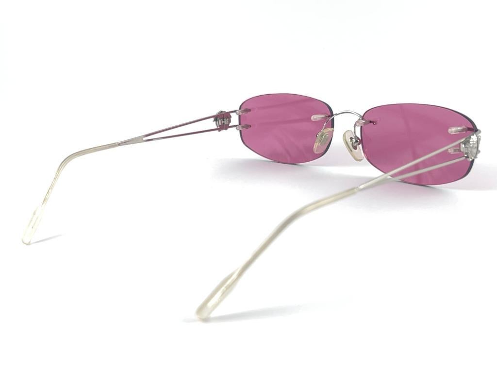 Vintage Versace Rimless Candy Pink Lenses Frame Sunglasses 1990's Made in Italy In Excellent Condition In Baleares, Baleares