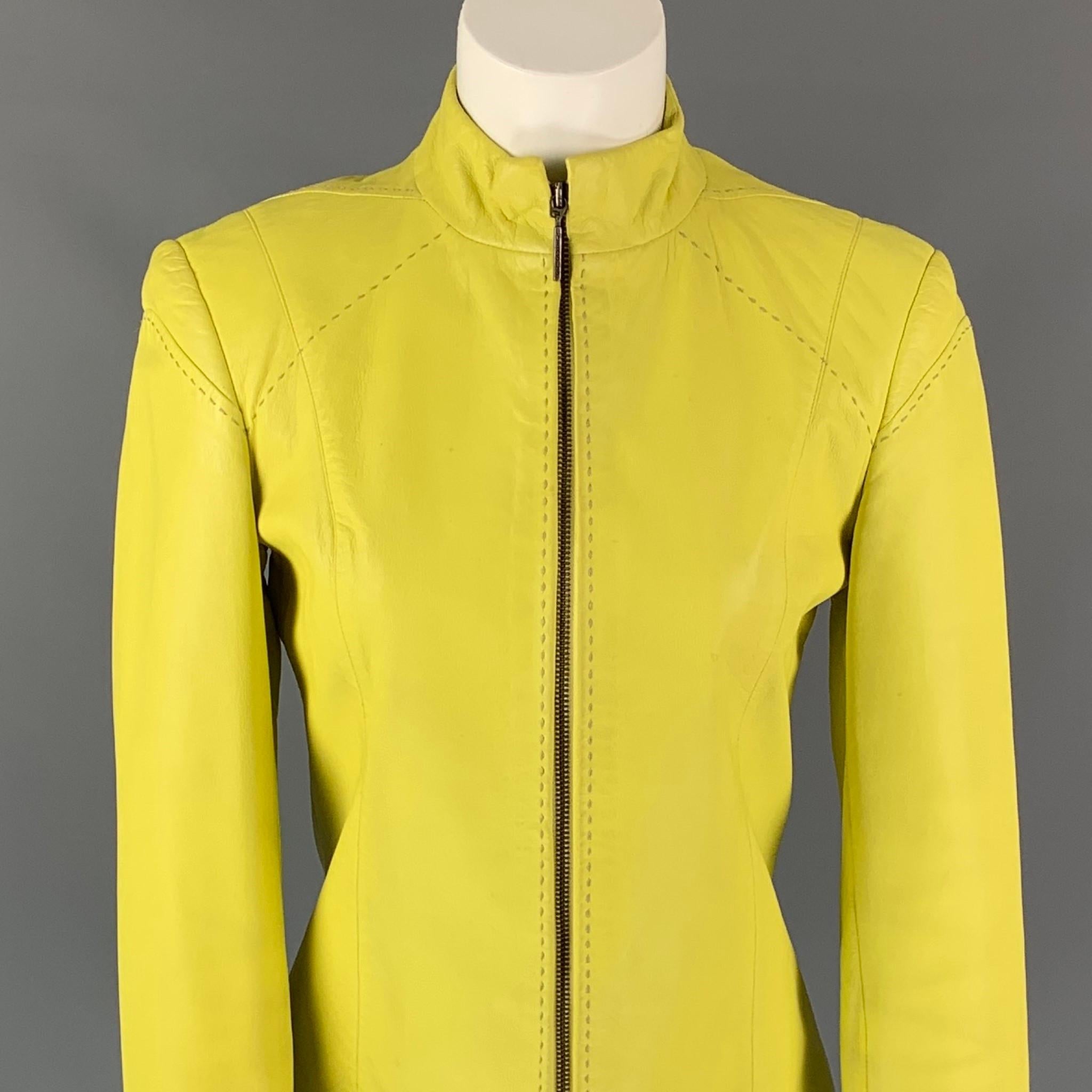 Vintage VERSUS by GIANNI VERSACE jacket comes in a yellow leather featuring a stand up collar, top stitching, and a full zip up closure. Made in Italy.

Good Pre-Owned Condition. Moderate marks at back.
Marked: 26/40

Measurements:

Shoulder: 16