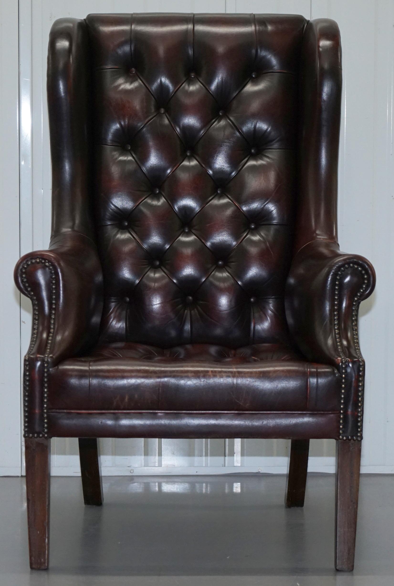 We are delighted to offer for sale this lovely Vintage aged Oxblood leather wingback armchair 

A very good looking decorative and comfortable armchair, the leather is soft and subtle, the timber hand stained and French polished

This chair has