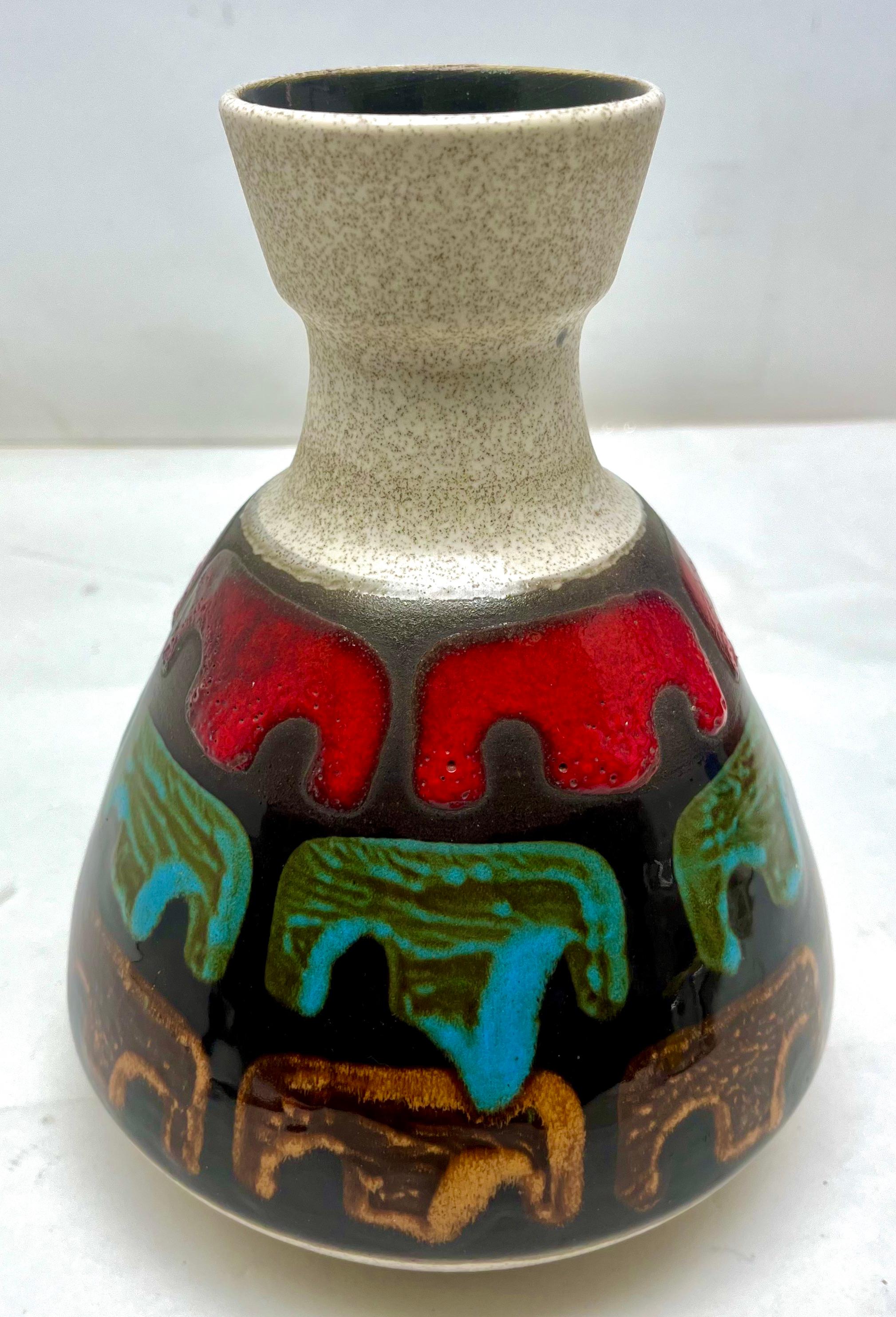 The piece is in excellent condition and a real beauty!
A real treasure for the ceramics' collector. 

There was a lot of craftsmanship and time necessary to make these vases.












