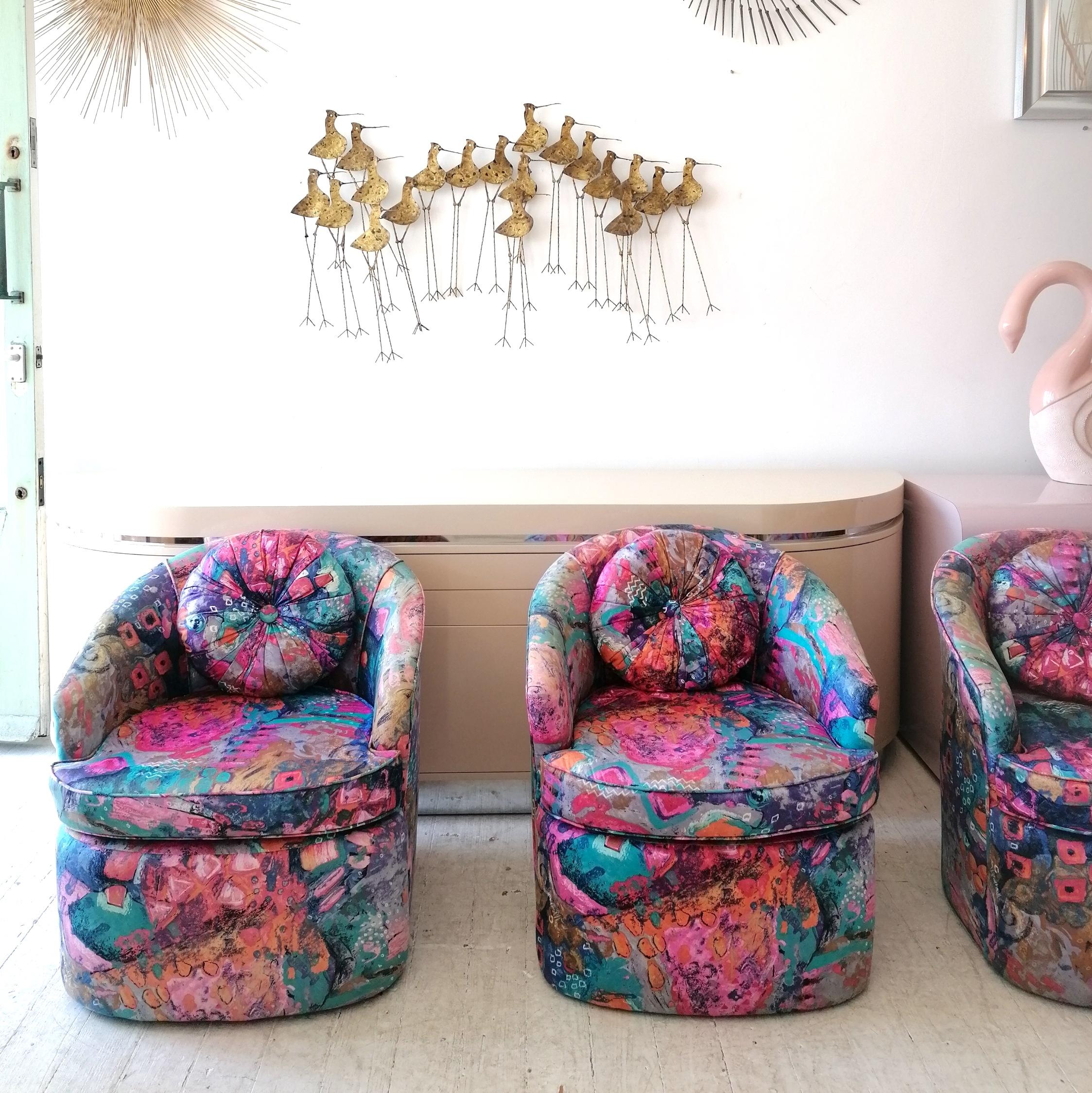 We have two of these amazing colourful armchairs on casters- this price is for ONE. Please select more from the drop-down menu if you'd like to buy more than one.
The original abstract-patterned upholstery is in excellent condition. 1980s American.