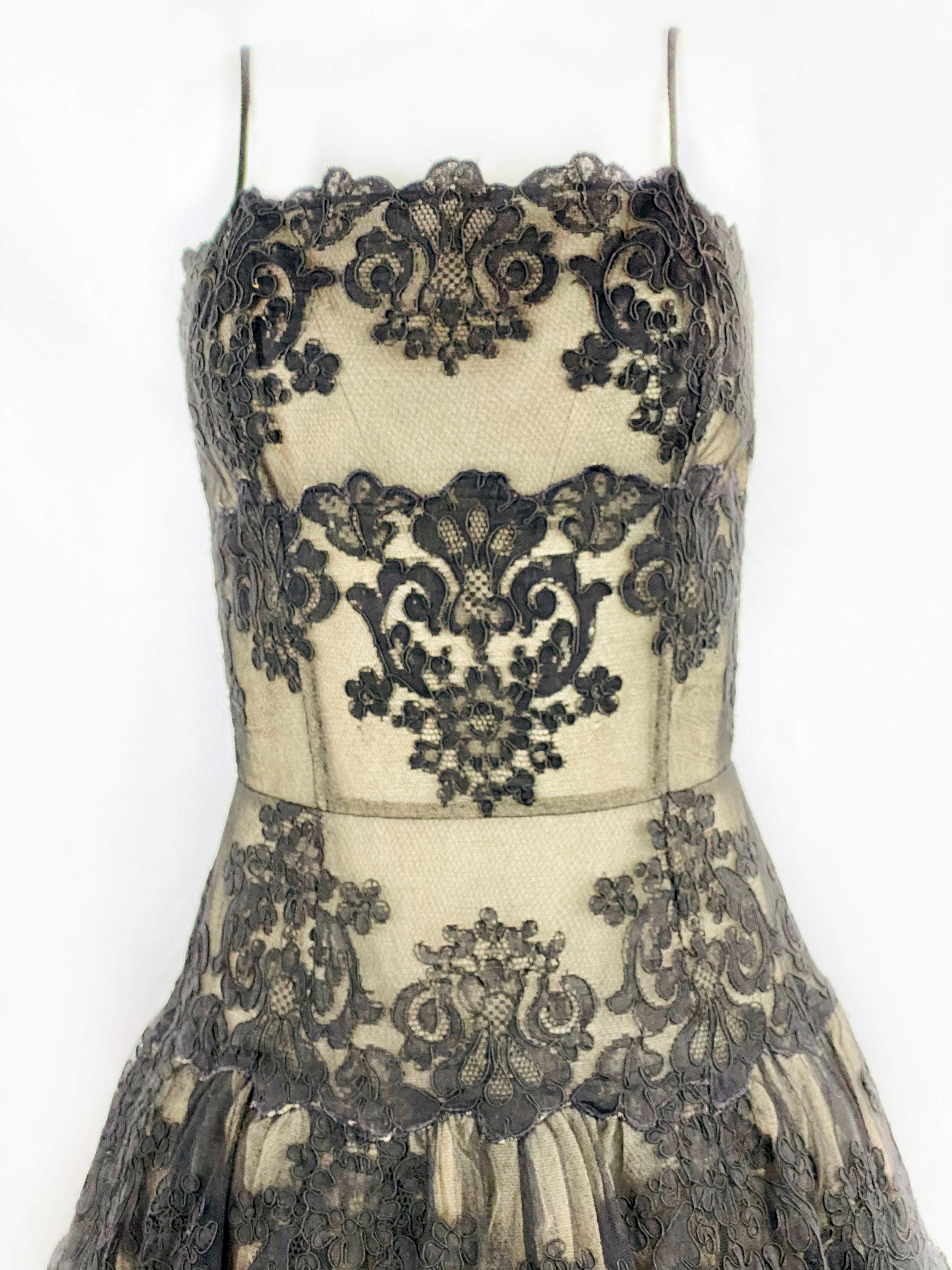 Vintage VICKY TIEL Couture Paris Black Floral Lace Sleeveless Mini Dress Size S

Product details:
Size S
Black and beige floral lace 
Noodle strap drop measures 5”
Rear zip closure measures 15.5”
Five layers skirt
Made in France 

