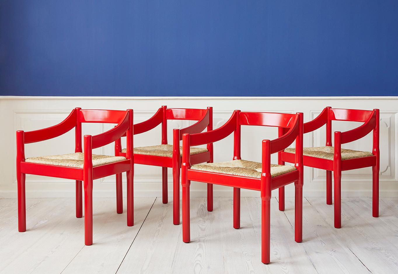 Vico Magistretti
Italy, 1959

A set of 4 Carimate dining chairs. Red painted wood, new wicker seat.

Industrial designer and architect Vico Magistretti (1920-2006) graduated from the Faculty of Architecture at Politecnico di Milano in