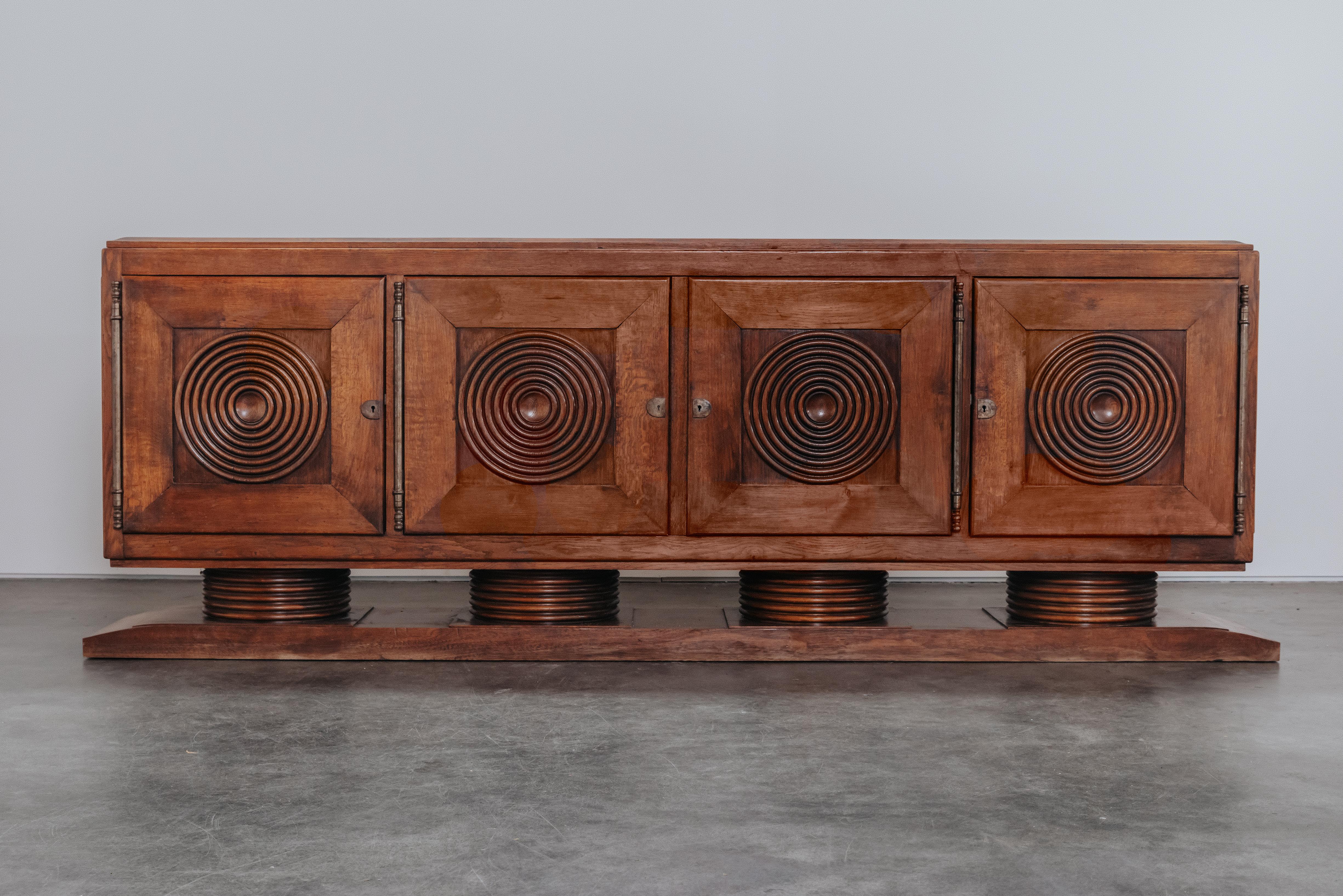 Vintage Victor Courtray Sideboard From France, Circa 1940..  Rare, large model in oak with four doors.  Nice patina and use.