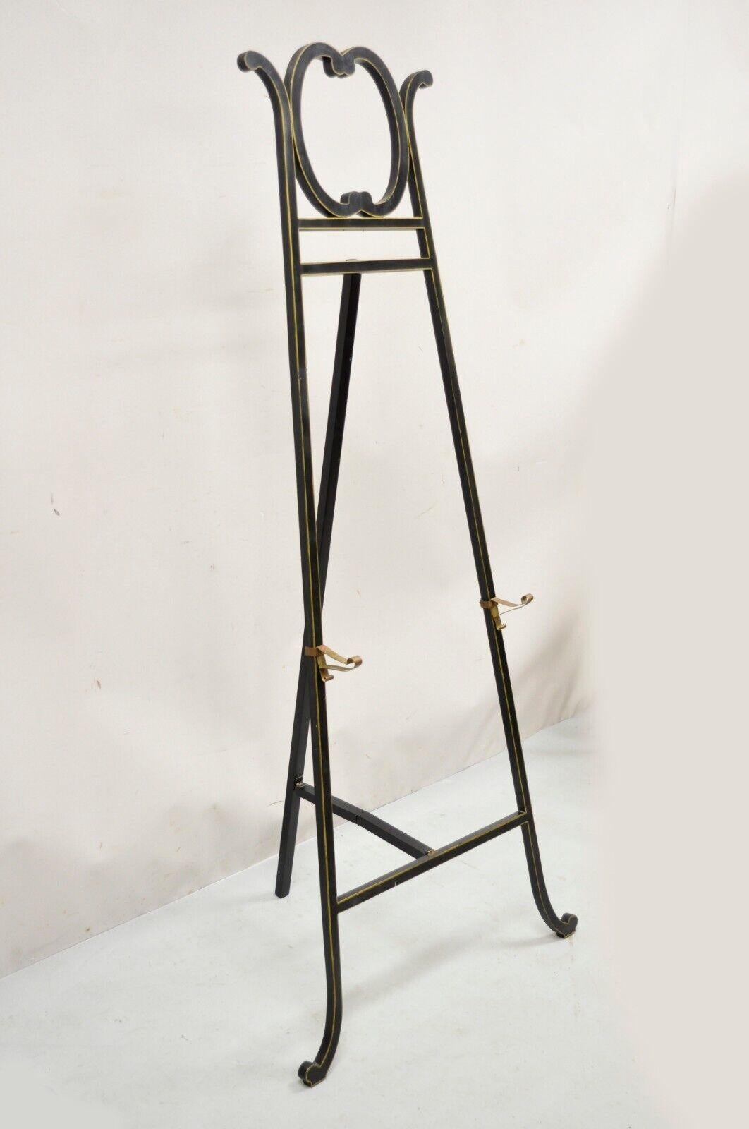 Vintage Victorian Aesthetic movement style Black Ebonized Art Painting Easel. Item features adjustable brass supports, folding design, ebonized finish with gold accents, solid wood frame, very nice item, great style and form. Circa mid 20th