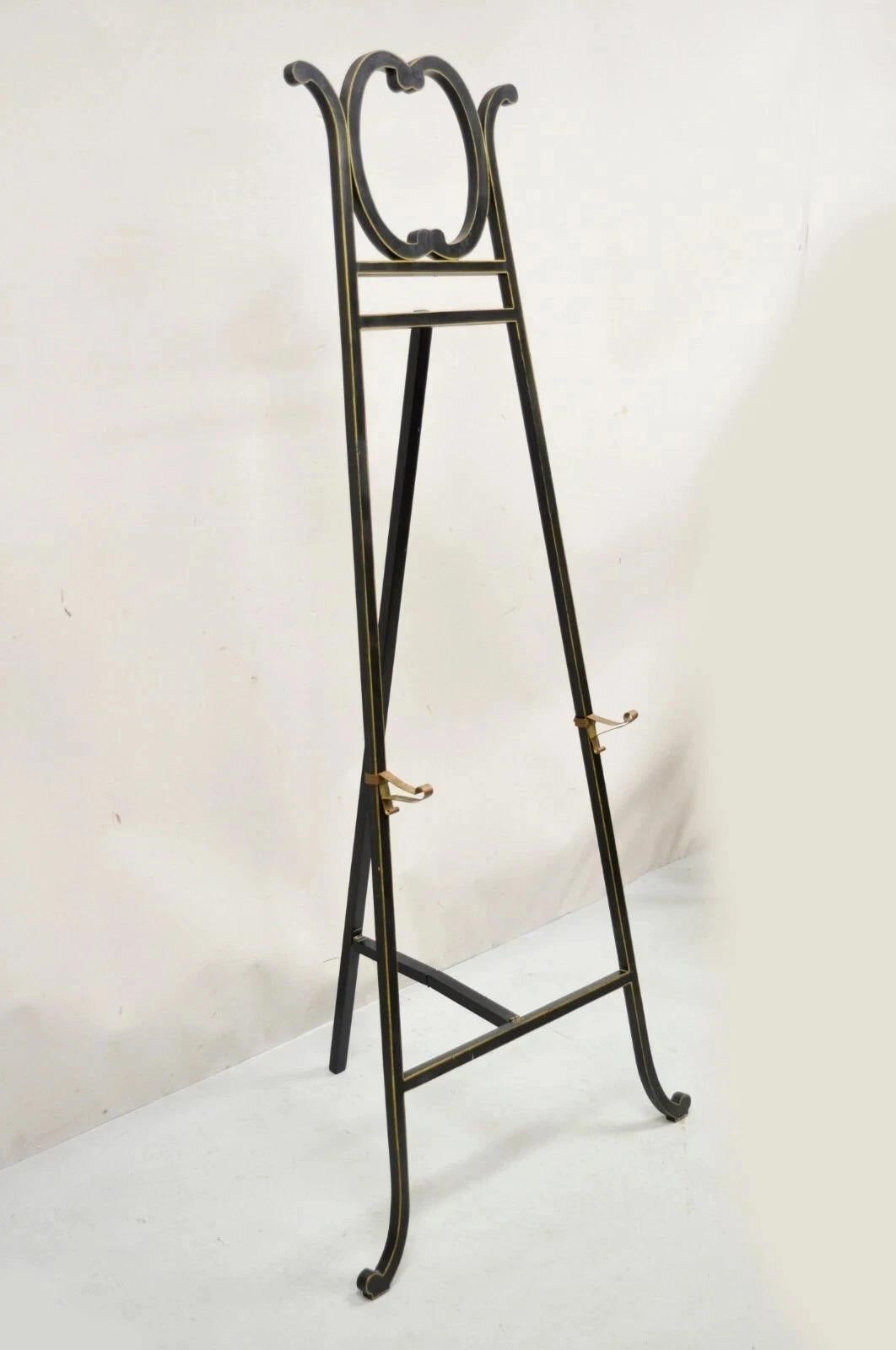 Caballete de pintura de estilo victoriano Aesthetic Movement negro ebonizado. Artículo con soportes de latón ajustables, diseño plegable, acabado ebonizado con detalles dorados, gran estilo y forma. Finales del siglo XX. Medidas: Abierta: 66,5
