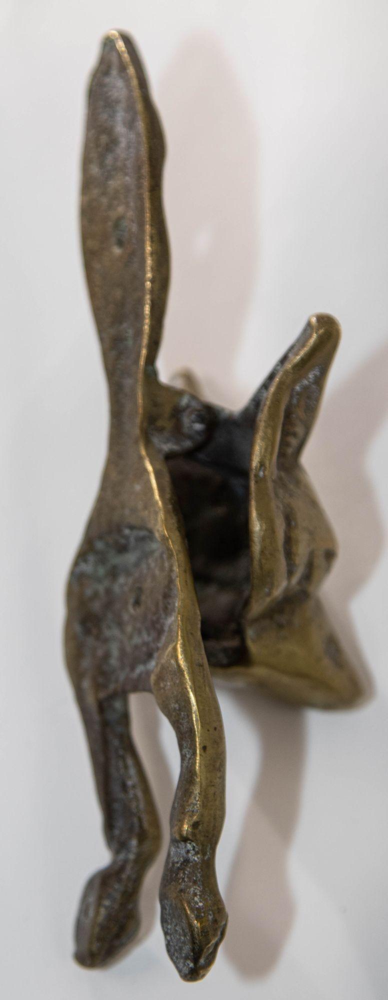 Vintage English cast brass fox door knocker circa 1940s.
A Victorian English solid cast brass fox door knocker. 
The vintage English cast brass fox door knocker is a charming and distinctive decorative element for a front door.
A brass door