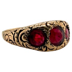 Anello vintage di epoca vittoriana con gemme rosse in oro rosa 10 carati