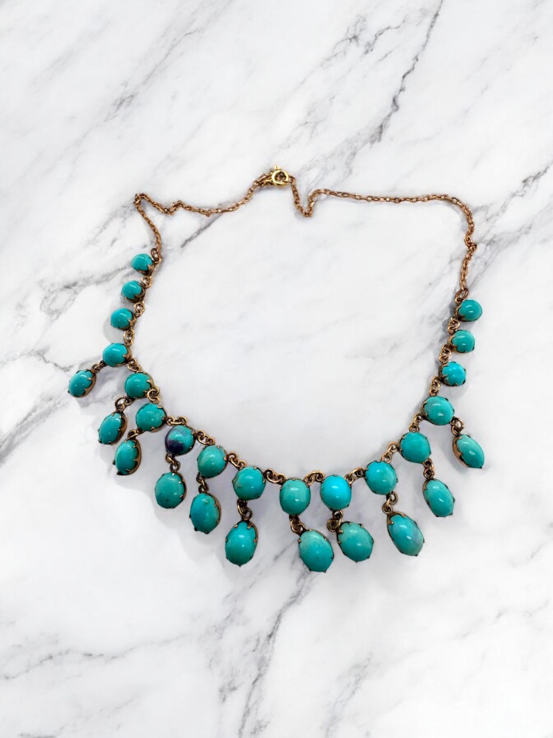 We are loving this rare vintage beauty!!

Necklace Details
Material: 10K Rose Gold; 14K Clasp
Era: Victorian 1840 - 1900
Weight: 11.7 Grams
Length: 16 1/2 Inches

Accented by the following gemstones
28 - Cabochon Cut Turquoise Gemstones

Item:
