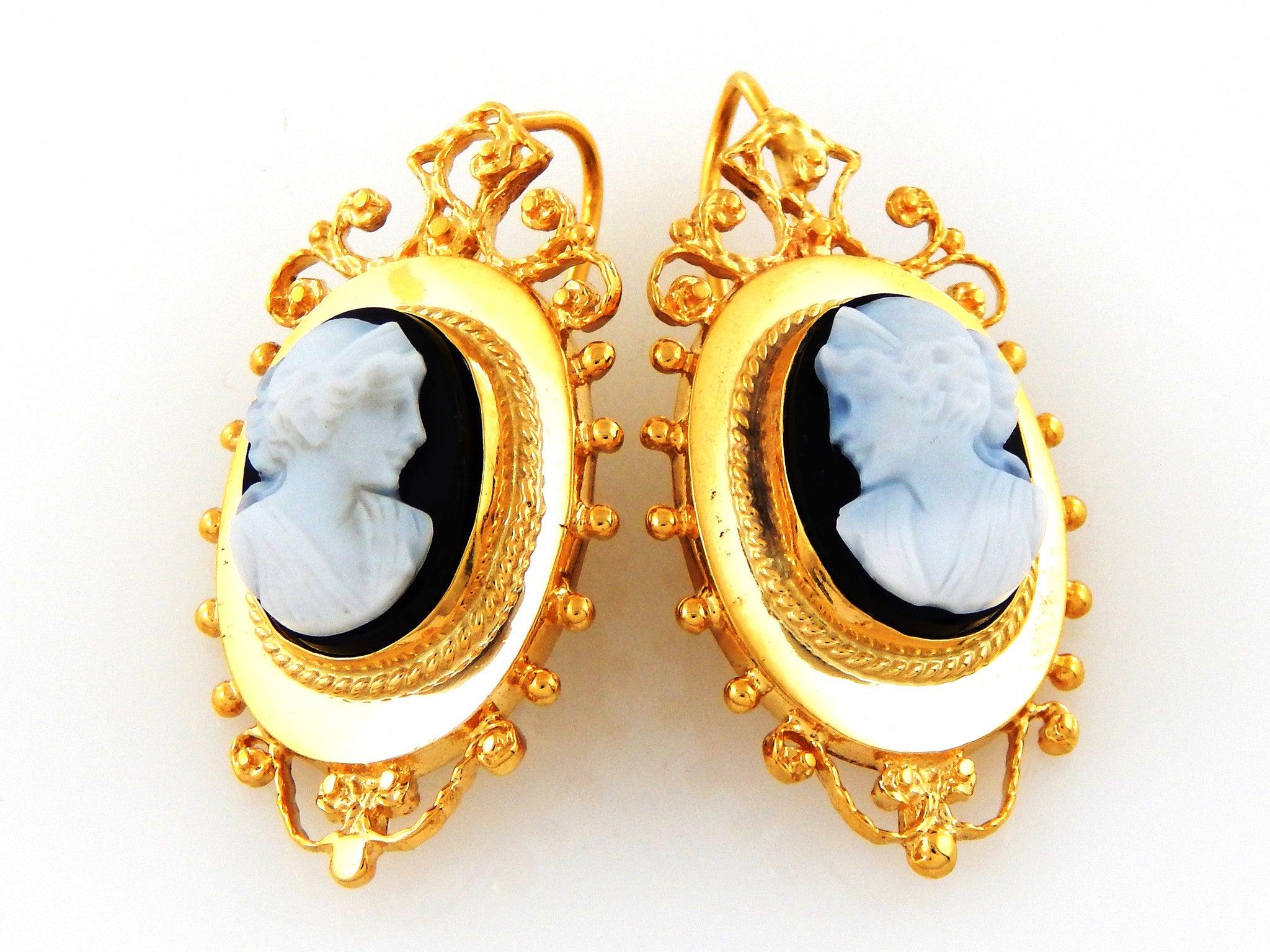 The antique cameo carving of fine 18k solid gold brooch & earrings is just simply astonishing. 
A smooth matte feeling of the cameo sculpture hand-carved on a black onyx is the antique/vintage 1930s collections everyone owned that still remains in