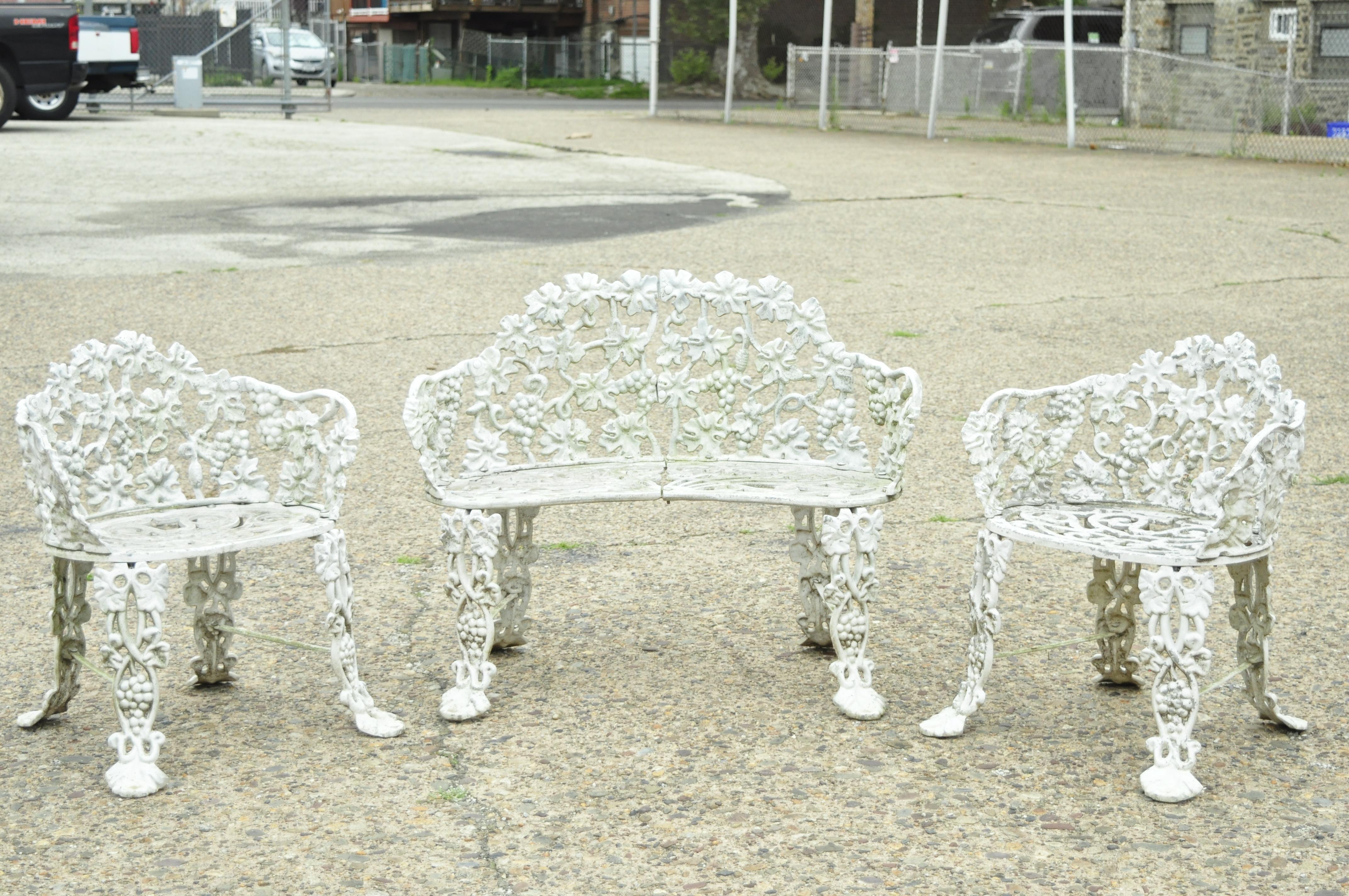 Vintage Victorian style grapevine cast aluminum garden patio set table chair - 4pc set. Item features (2) chairs, (1) loveseat, (1) table, pierced rococo design, nice smaller size, cast aluminum construction. Circa Mid to Late 20th Century.
