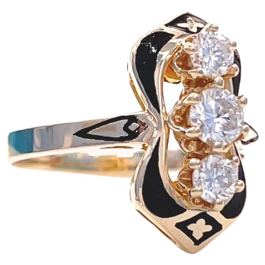 Are you a fan of gold and black enamel jewelry? It is definitely a distinctive looks that carries a lot of symbolism and meaning. This Vintage Victorian Inspired Three Stone Diamond 14k Gold Ring would be the perfect addition to your estate jewelry