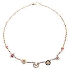 Vintage - viktorianische Multi Charm-Halskette aus 15 Karat Gold mit Rubinen, Saphiren und Birne